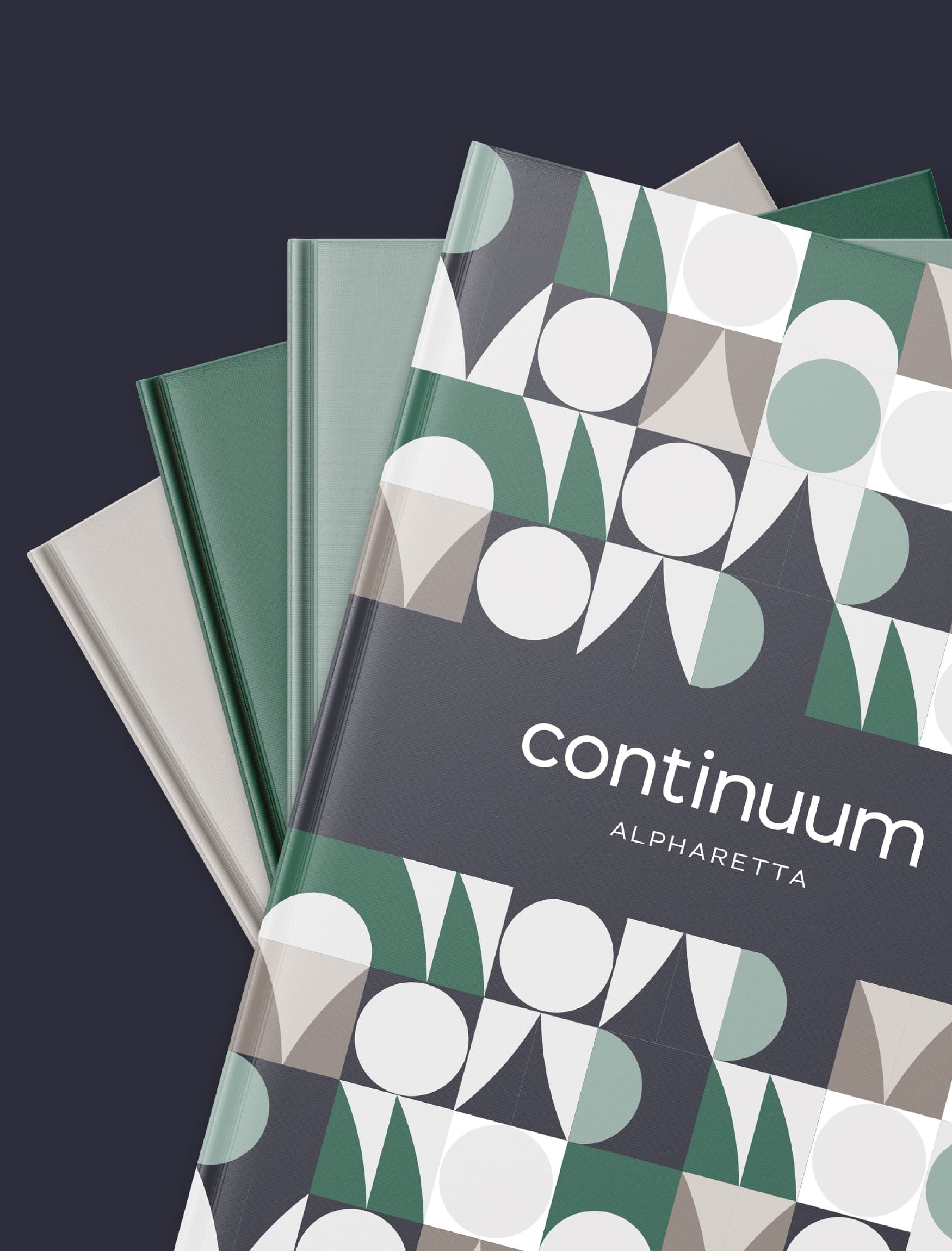 Flatlay of Continuum Alpharetta books, designed by RSM Design. 