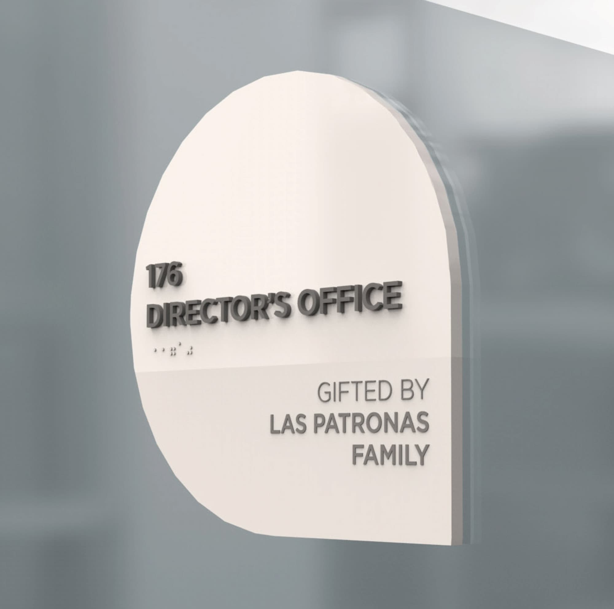 Interior room identification signage for a director’s office featuring dimensional typography, tactile lettering, and donor recognition, exemplifying environmental graphic design, ADA-compliant wayfinding, and branded signage by RSM Design within education and institutional environments.