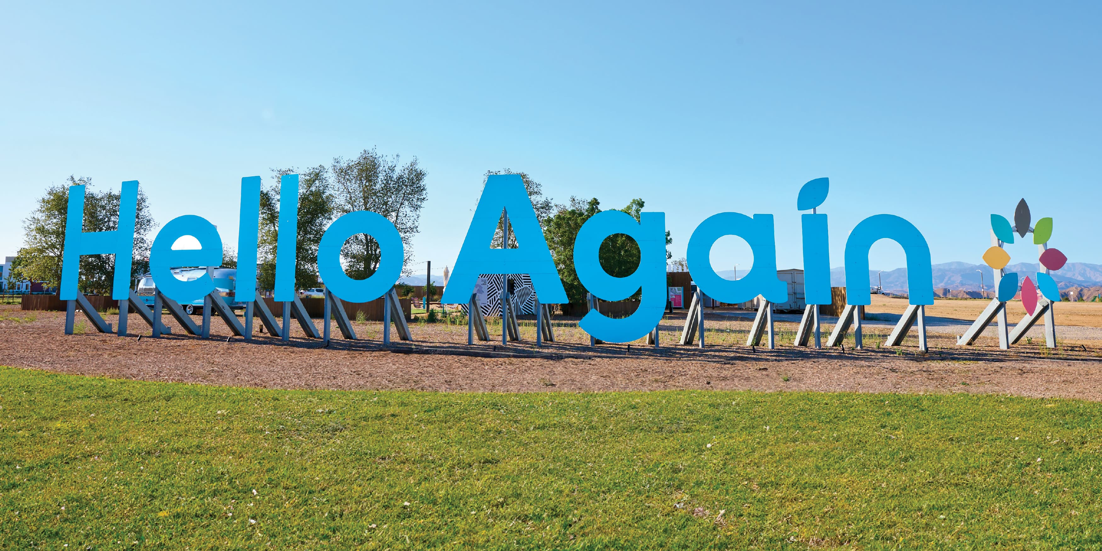 Image of the "Hello Again" bold large letters. Temporary graphics designed for Valencia by RSM Design. 