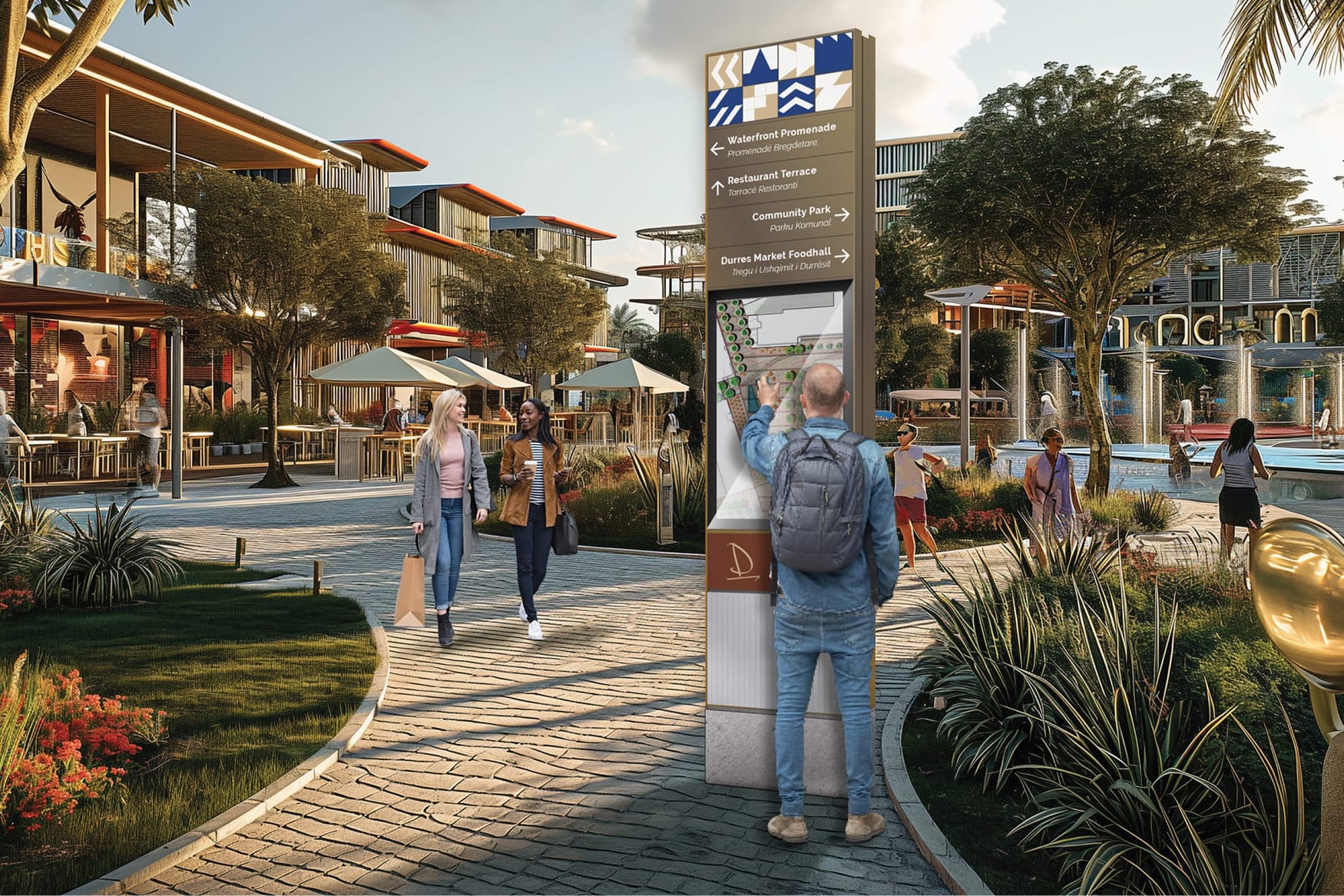 Pedestrian plaza with integrated wayfinding signage, showing visitors navigating a vibrant mixed-use waterfront environment with retail, dining, and public spaces.
