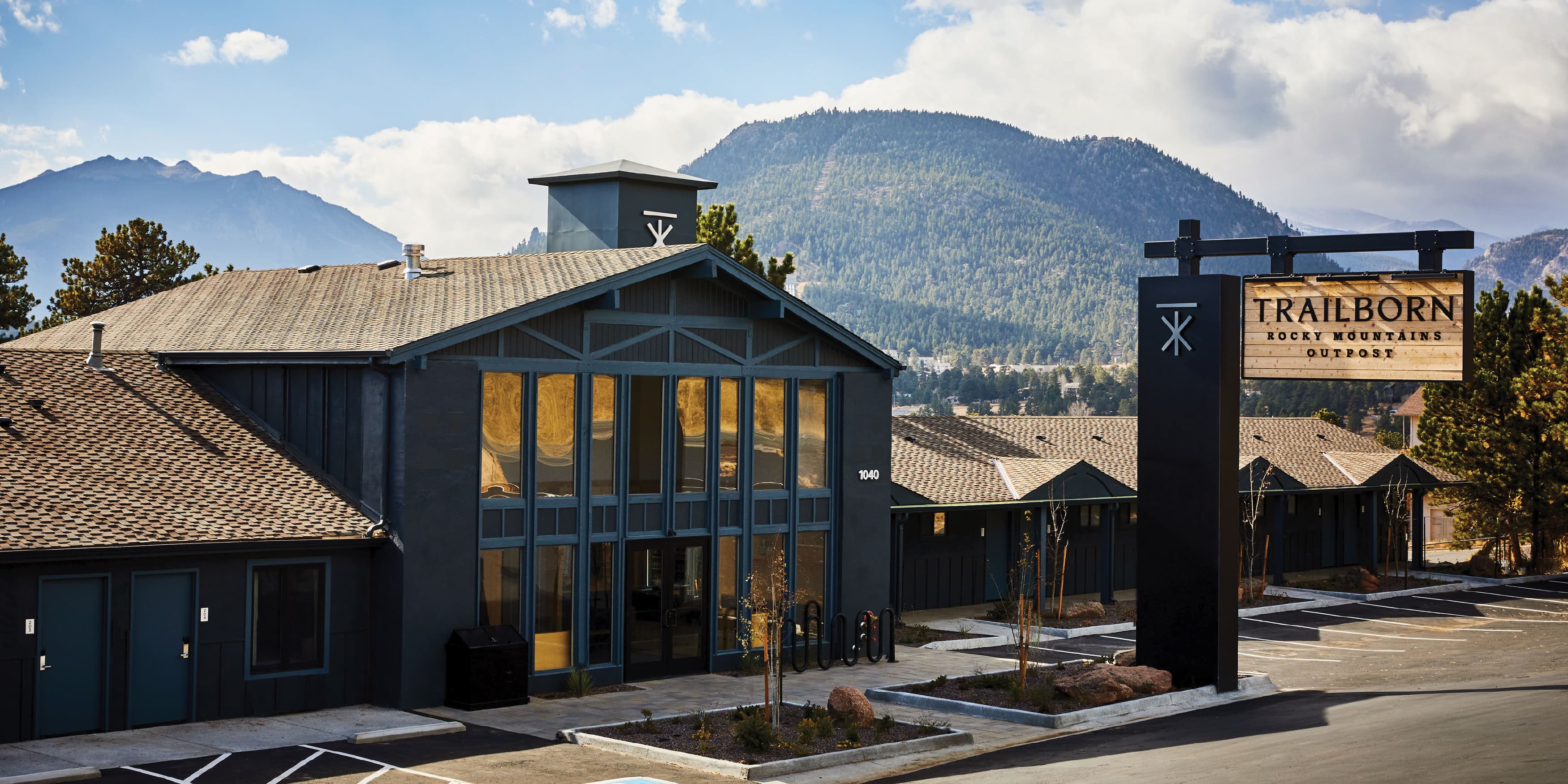 Overall context shot of the Trailborn Rocky Mountains Hotel. Wayfinding signage design by RSM Design. 