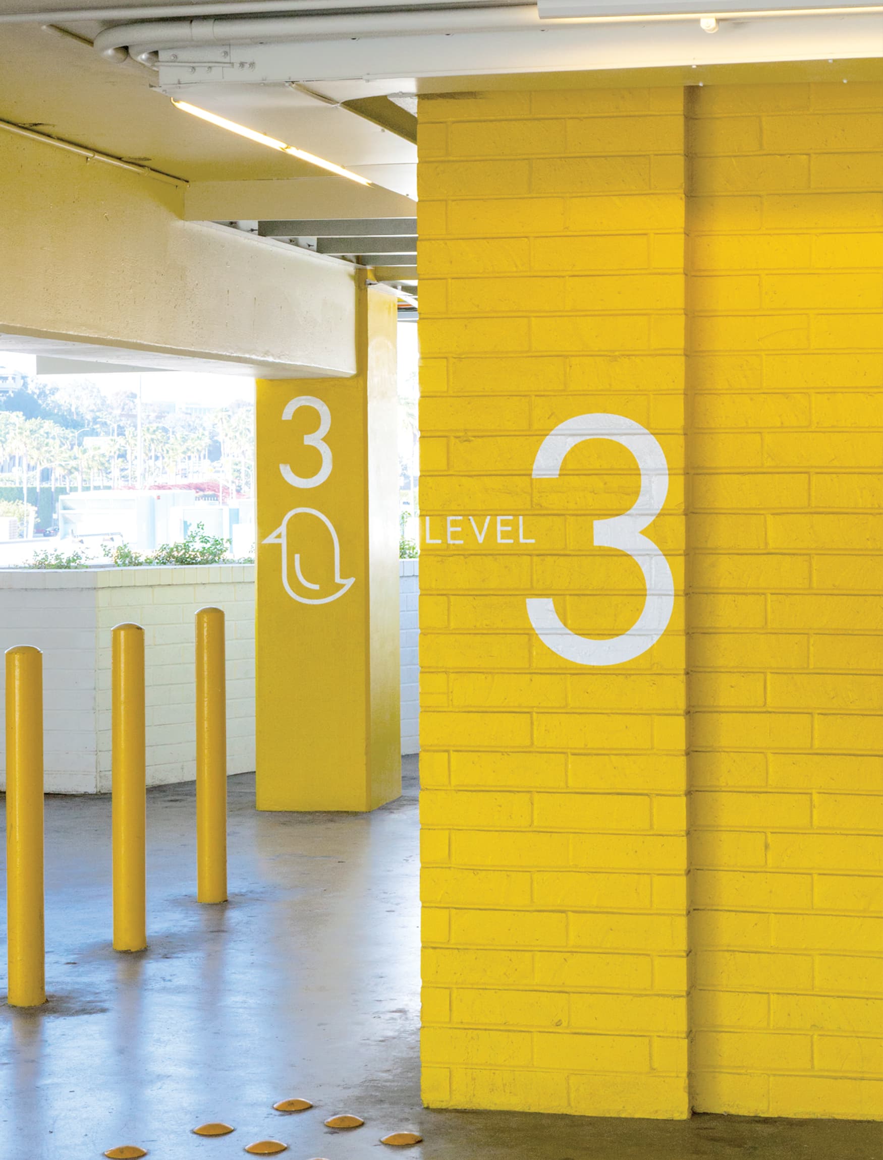 Parking garage color identification designed by RSM Design. Yellow level signage and typography by RSM Design for RSM Design. 