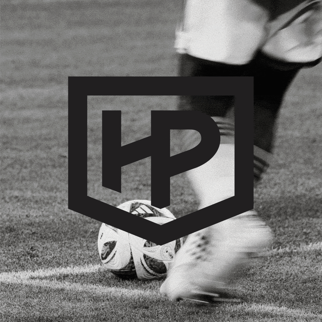 Black HP shield monogram over a black-and-white photo of a soccer player’s cleat and ball on a turf field, Hylo Park, Las Vegas, brand identity design by RSM Design.