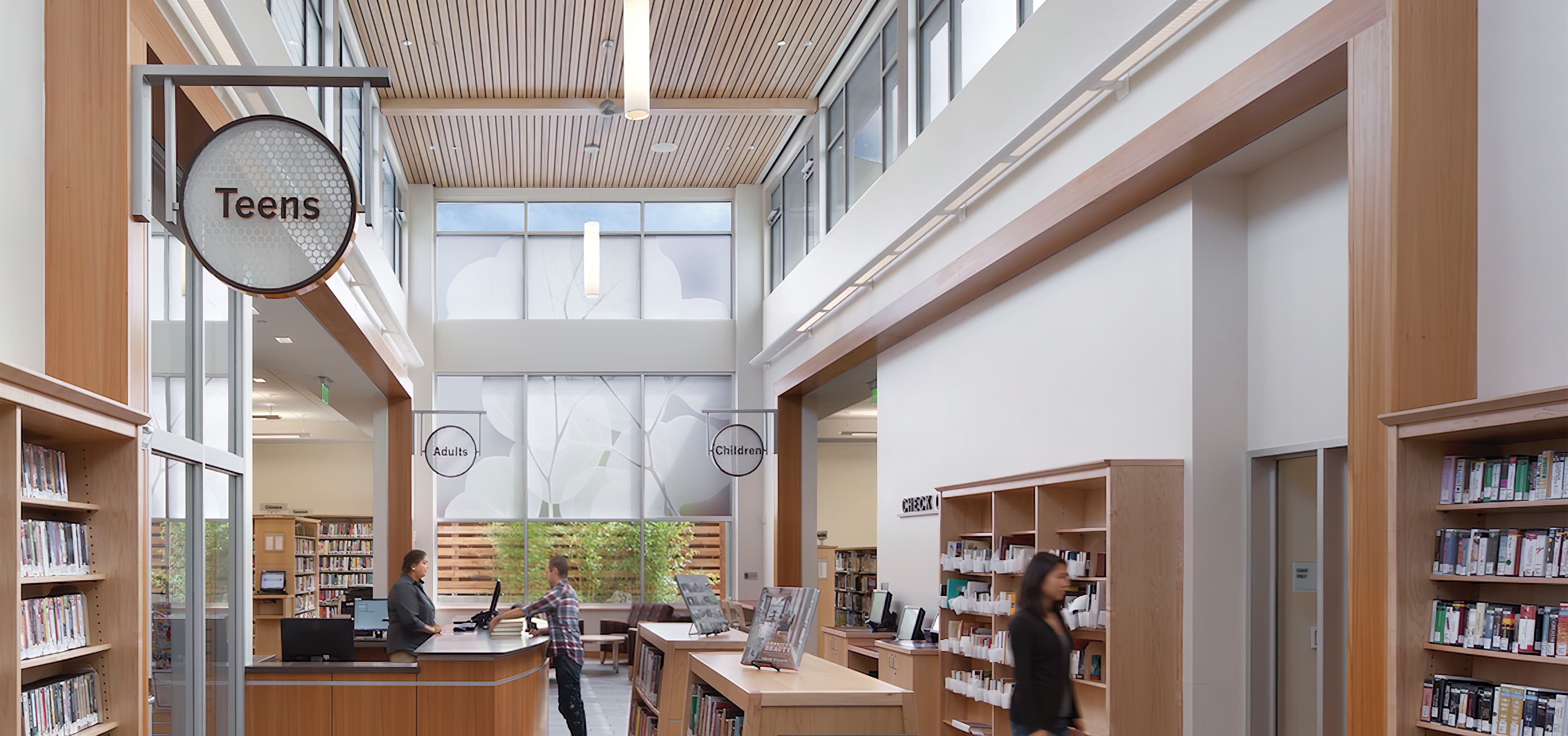 Berkeley Public Library South Branch. Our team developed a friendly and informative system of signage and placemaking elements in both the interior and exterior, our scope included identity and wayfinding signage.
