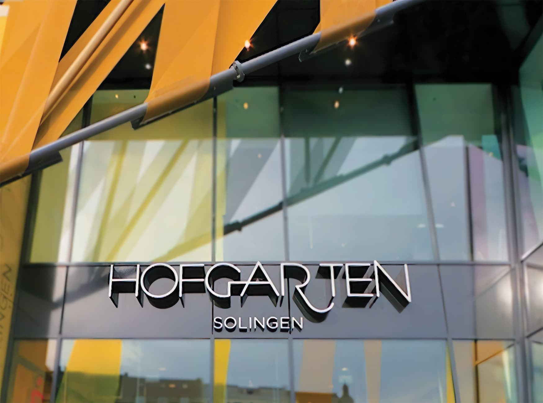 Hofgarten, a retail project in Solingen Germany, project identity illuminated signage design.