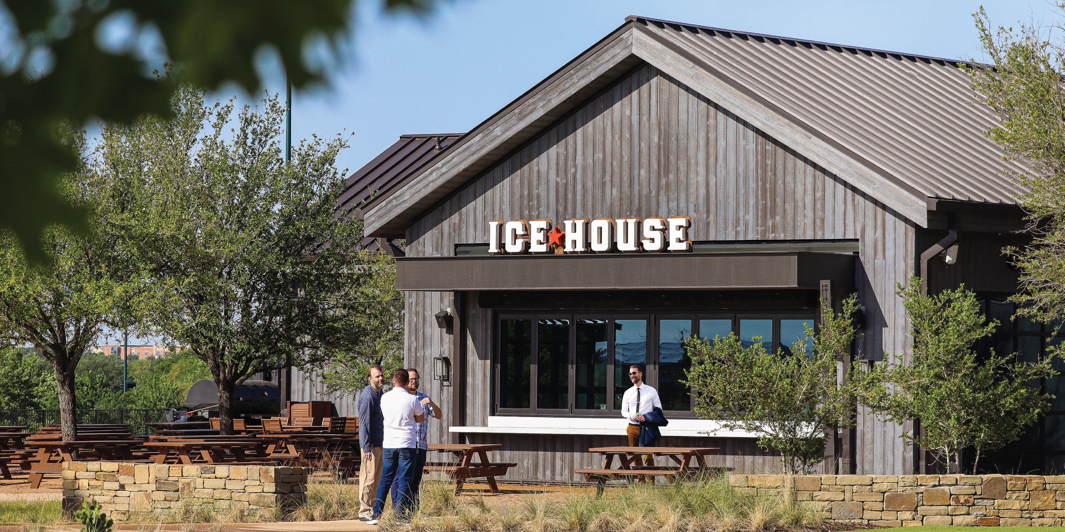 Image of the Ice House building, with signage designed by RSM Design for the Omni PGA Frisco Resort. 