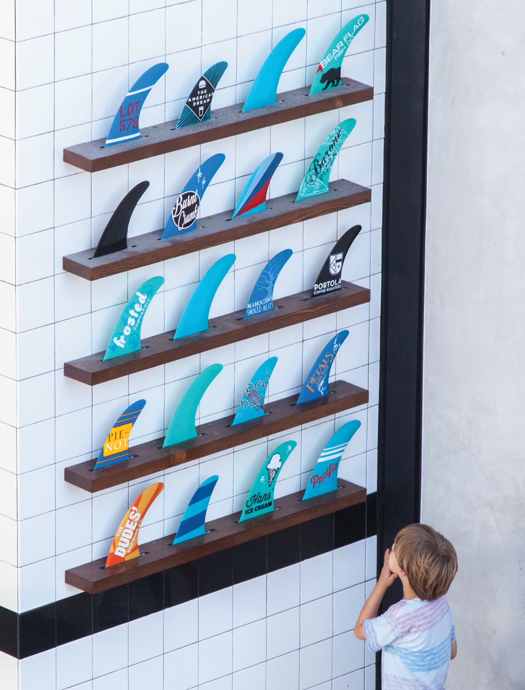 Surf inspired directory made out of surf fins, designed by RSM Design. 