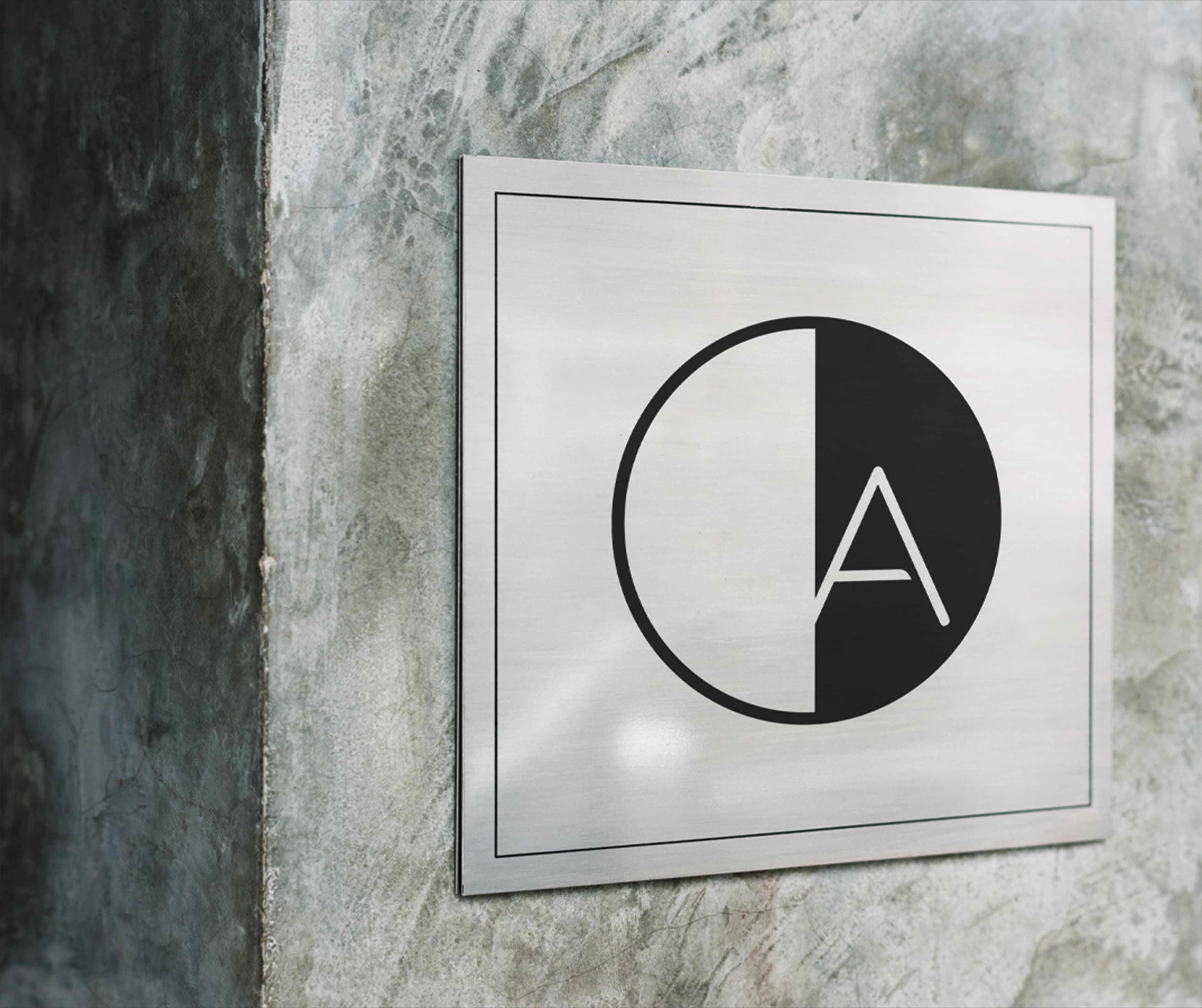 American Dream Retail Project Design in East Rutherford, New Jersey. Branded plaque sign identity.