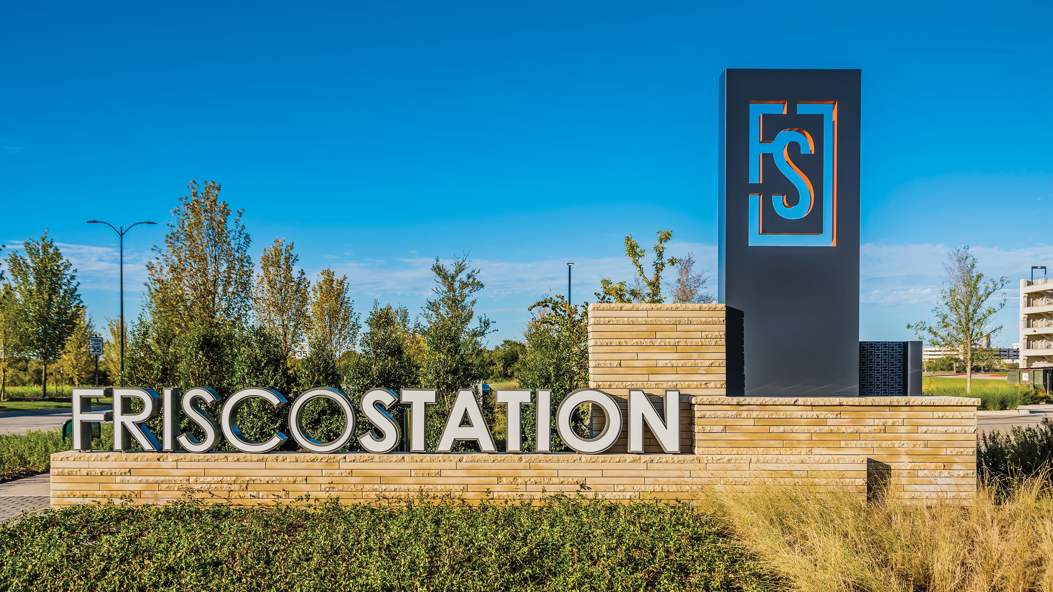 Monument Signage at the mixed-use Frisco Station project in Frisco, Texas