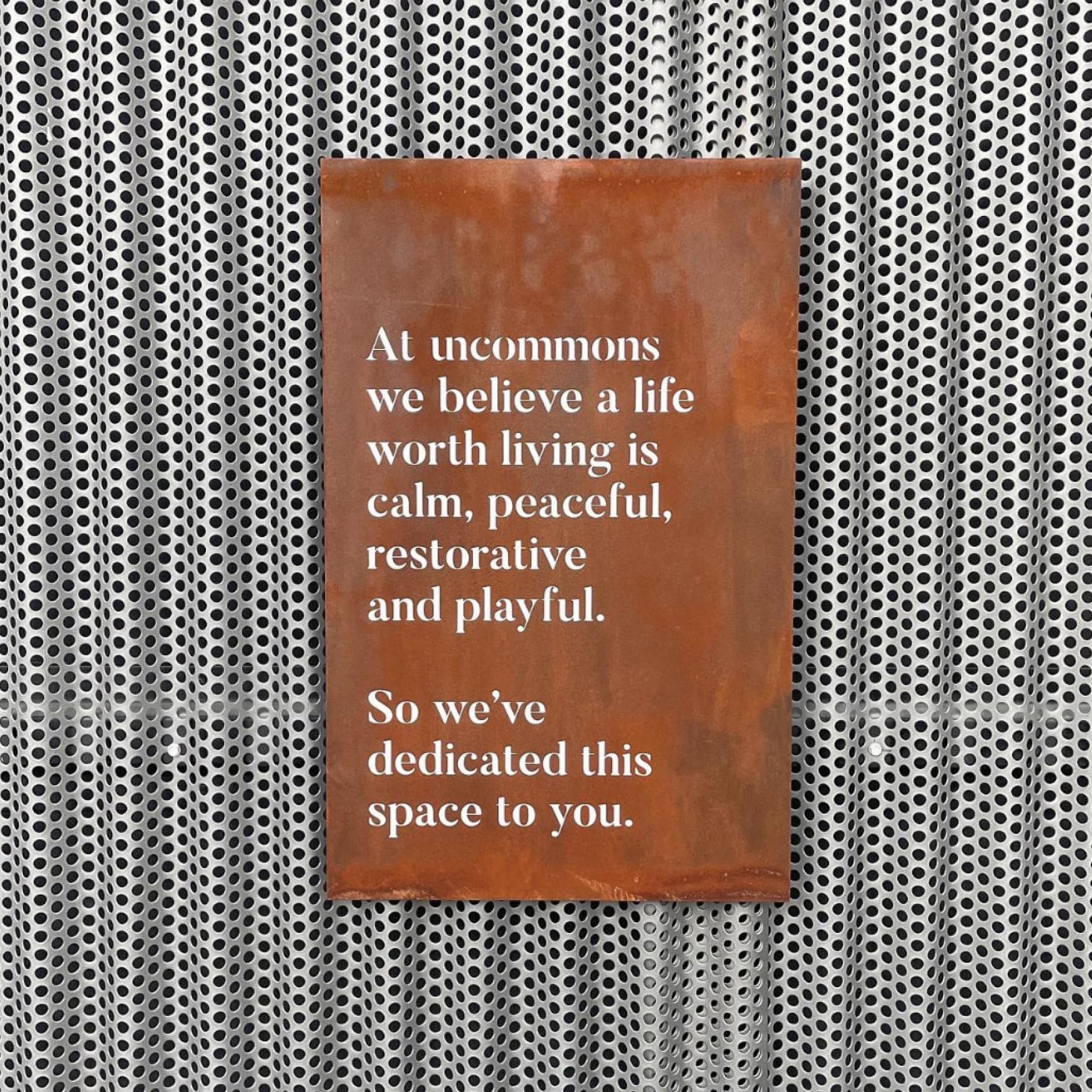 Image of a quote designed on a plaque, designed by RSM Design for UnCommons. 