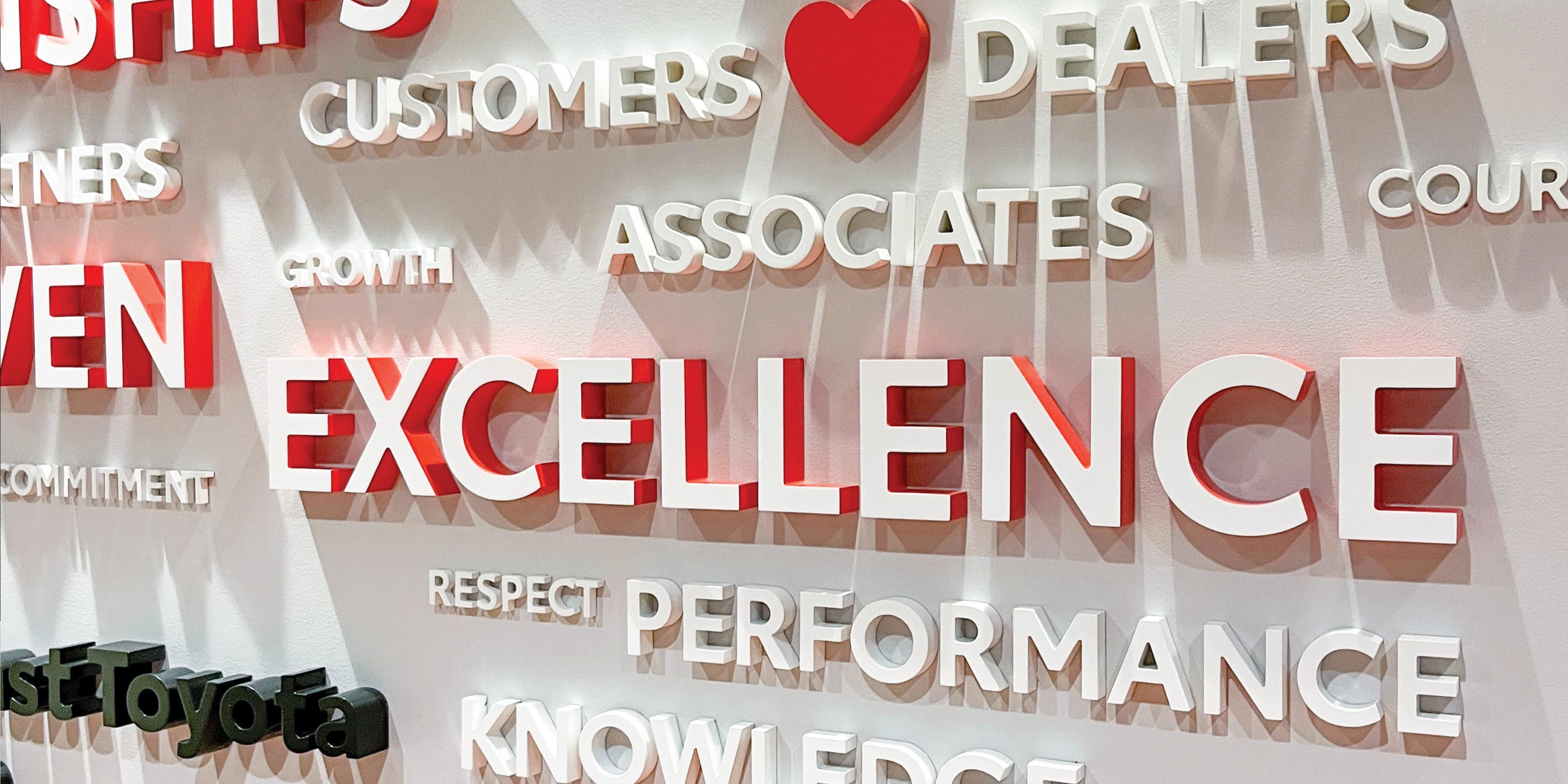 Detail image of the wall of value for JM Family Headquarters. 