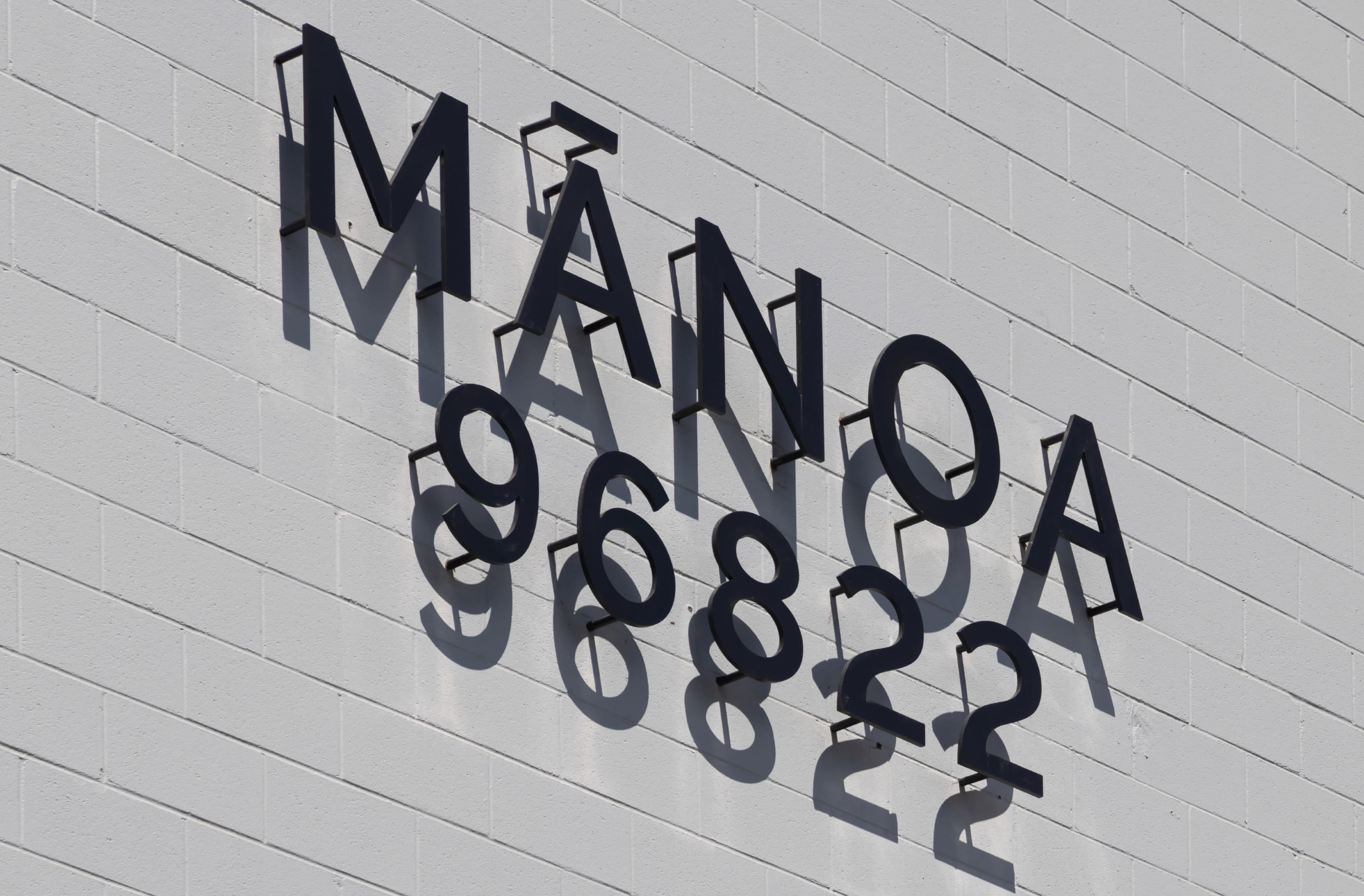 Detail shot of the Manoa signage at Atherton Rise by RSM Design. 