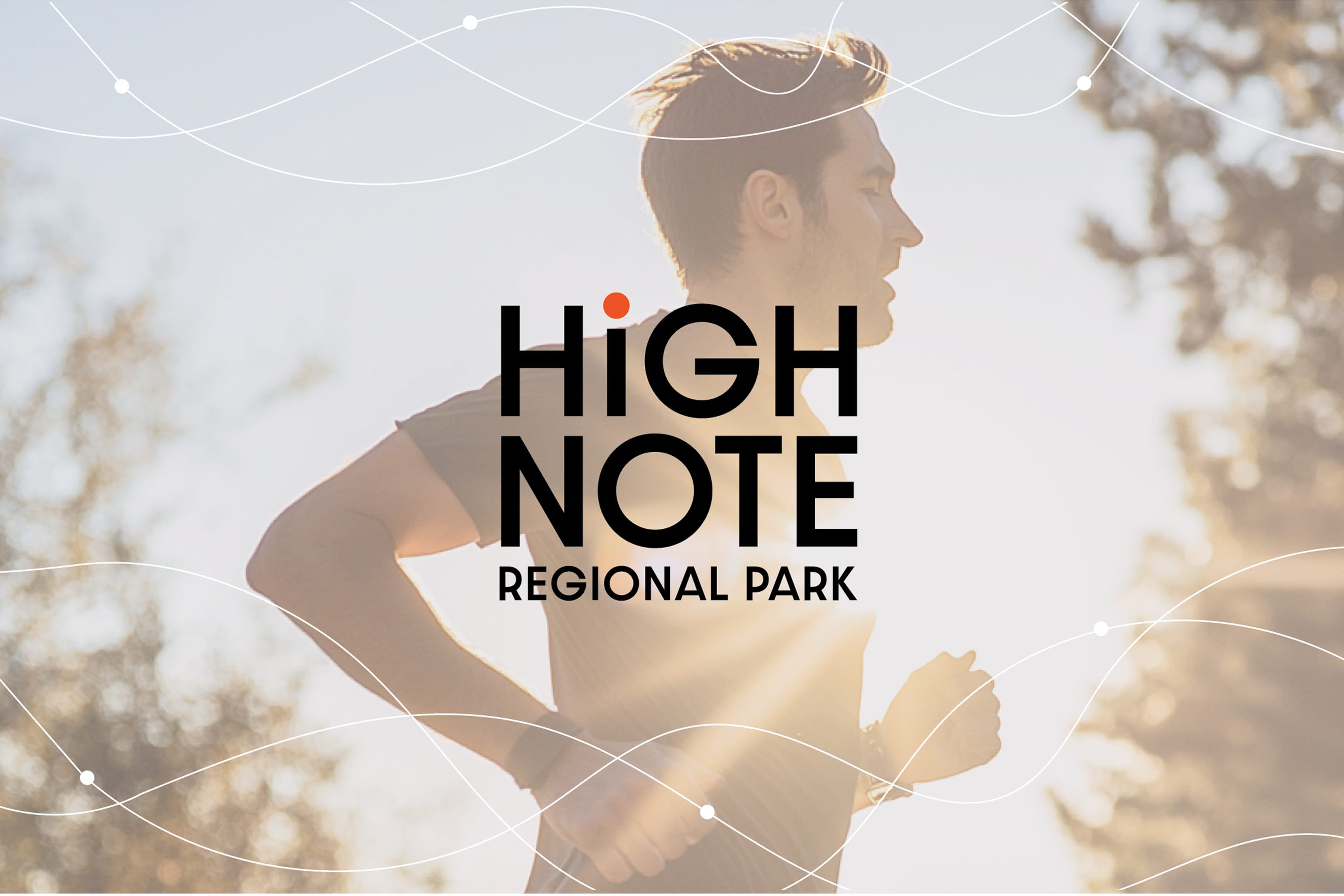 HighNote Regional Park logo with orange accent dot over a sunlit image of a man trail running, layered with wave-line graphic motifs — brand identity by RSM Design.