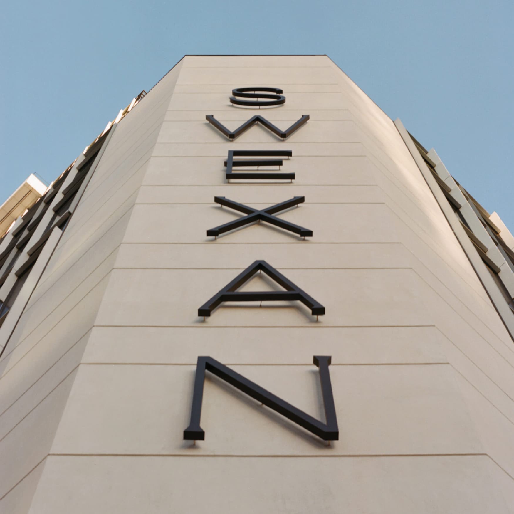 Image from the ground of the Hotel Swexan building identity in Dallas, Texas, designed by RSM Design. 