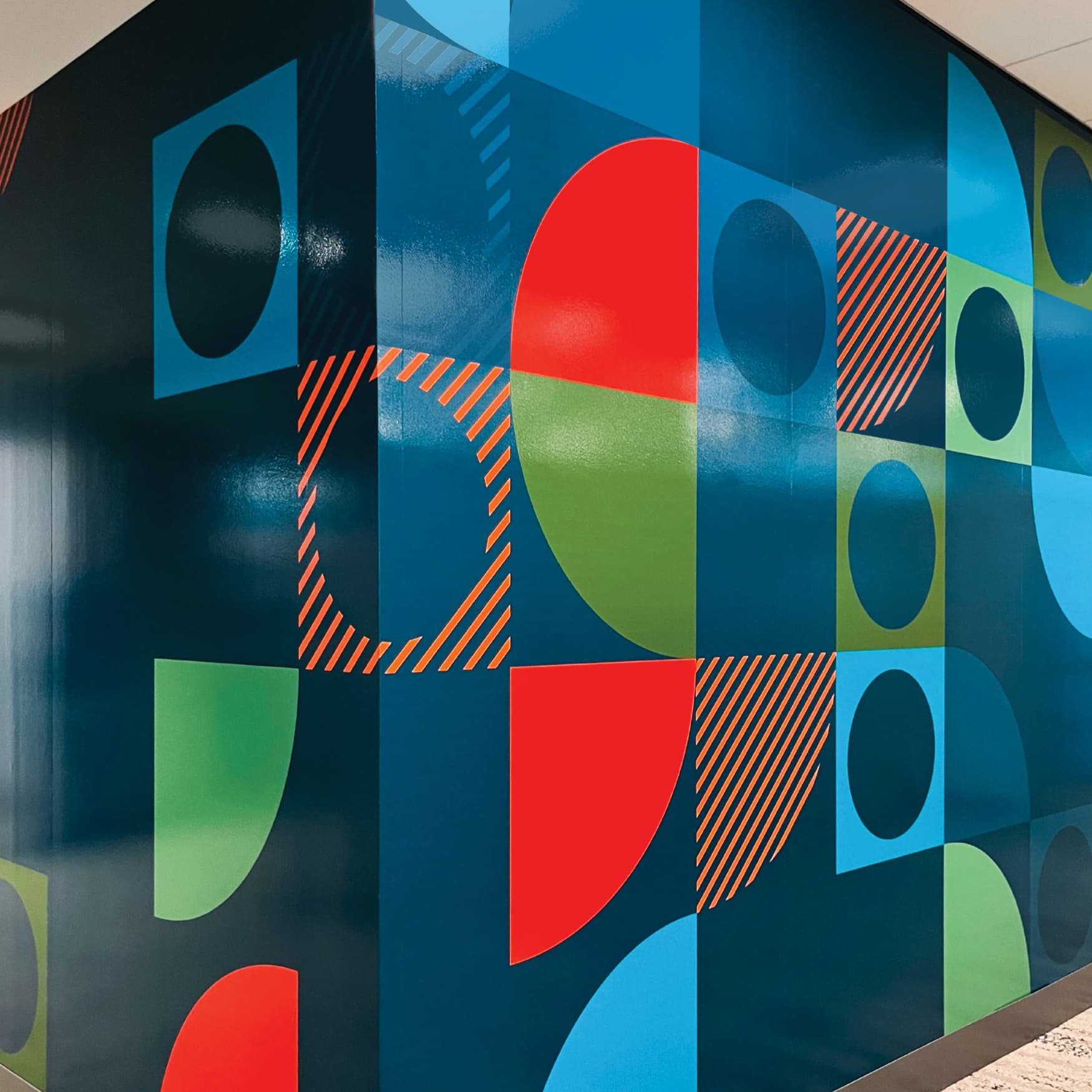 Colorful mural with geometric shapes for JM Family Headquarters. 