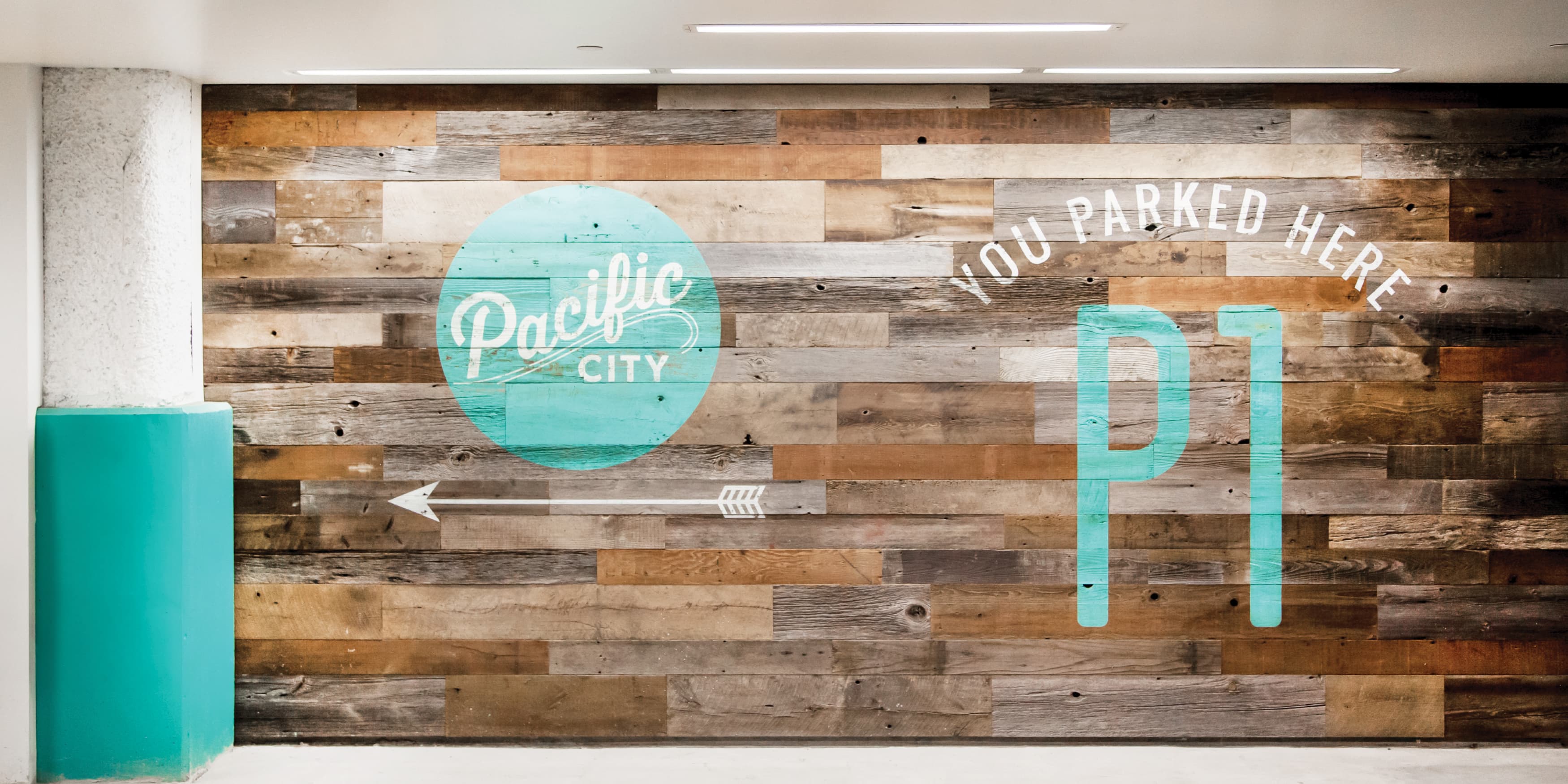 Wooden wall mural graphic designed by RSM Design for the Pacific City in Huntington Beach, CA. 