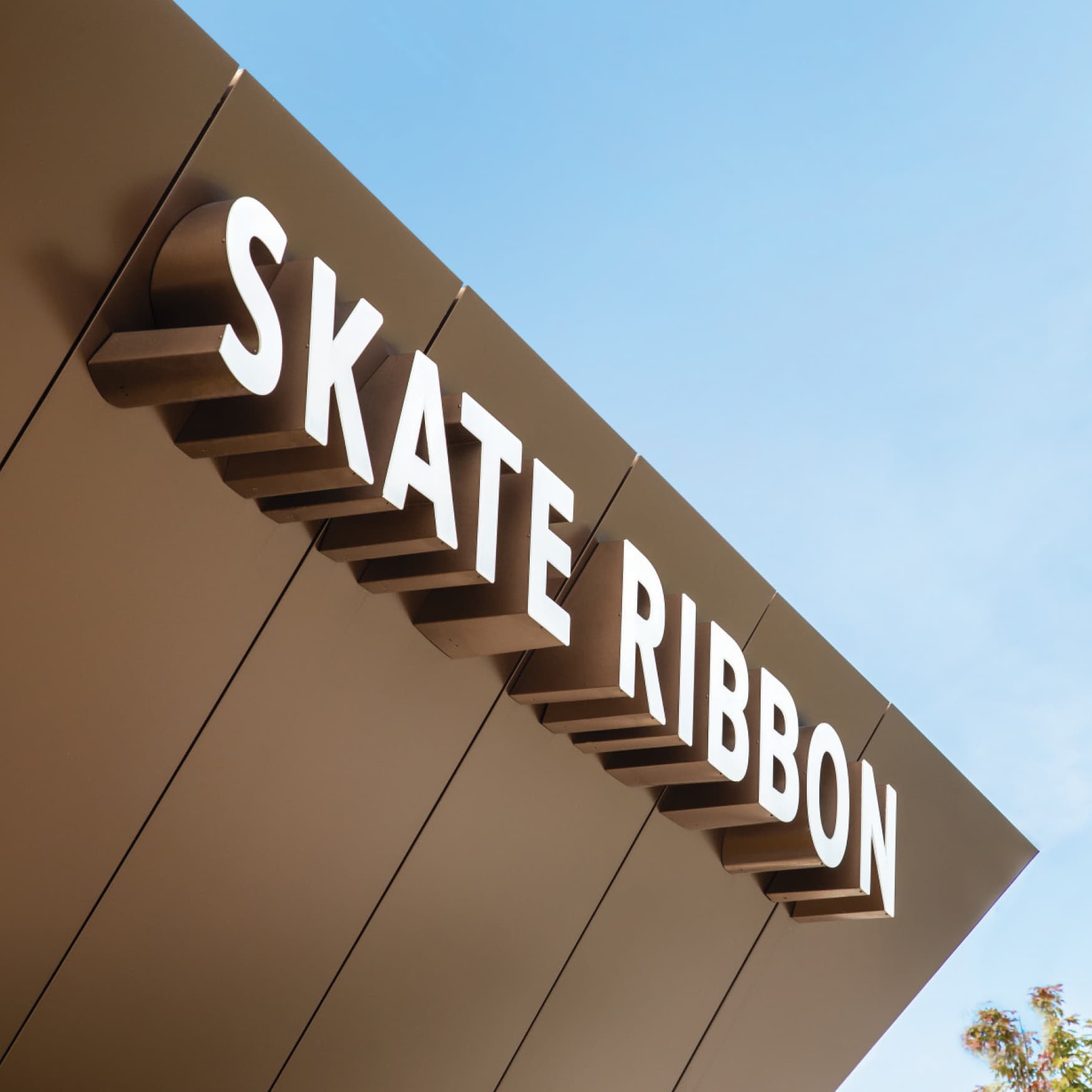 Close up detail of the Omaha RiverFront Skate Ribbon signage, designed by RSM Design. 