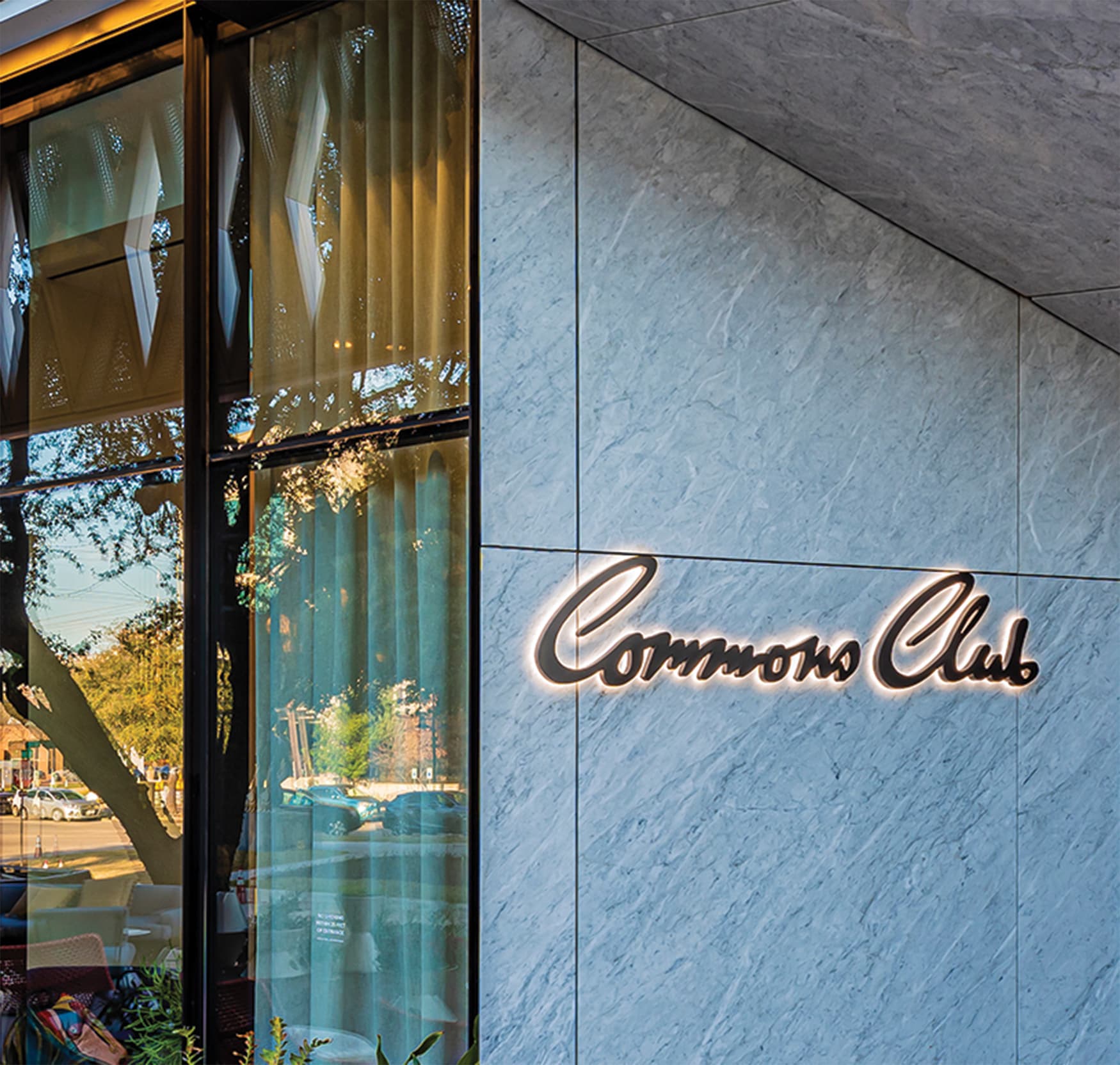 Commons Club at Virgin Hotel Dallas signage with halo illumination.