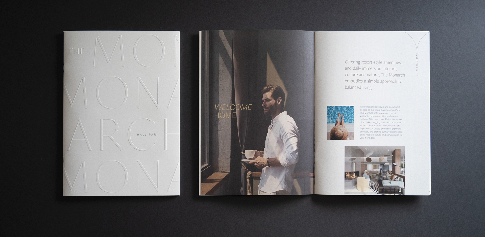 The Monarch at Hall Park luxury residential marketing brochure — embossed cover and interior spread with lifestyle photography and resort-style amenities editorial layout, print design by RSM Design