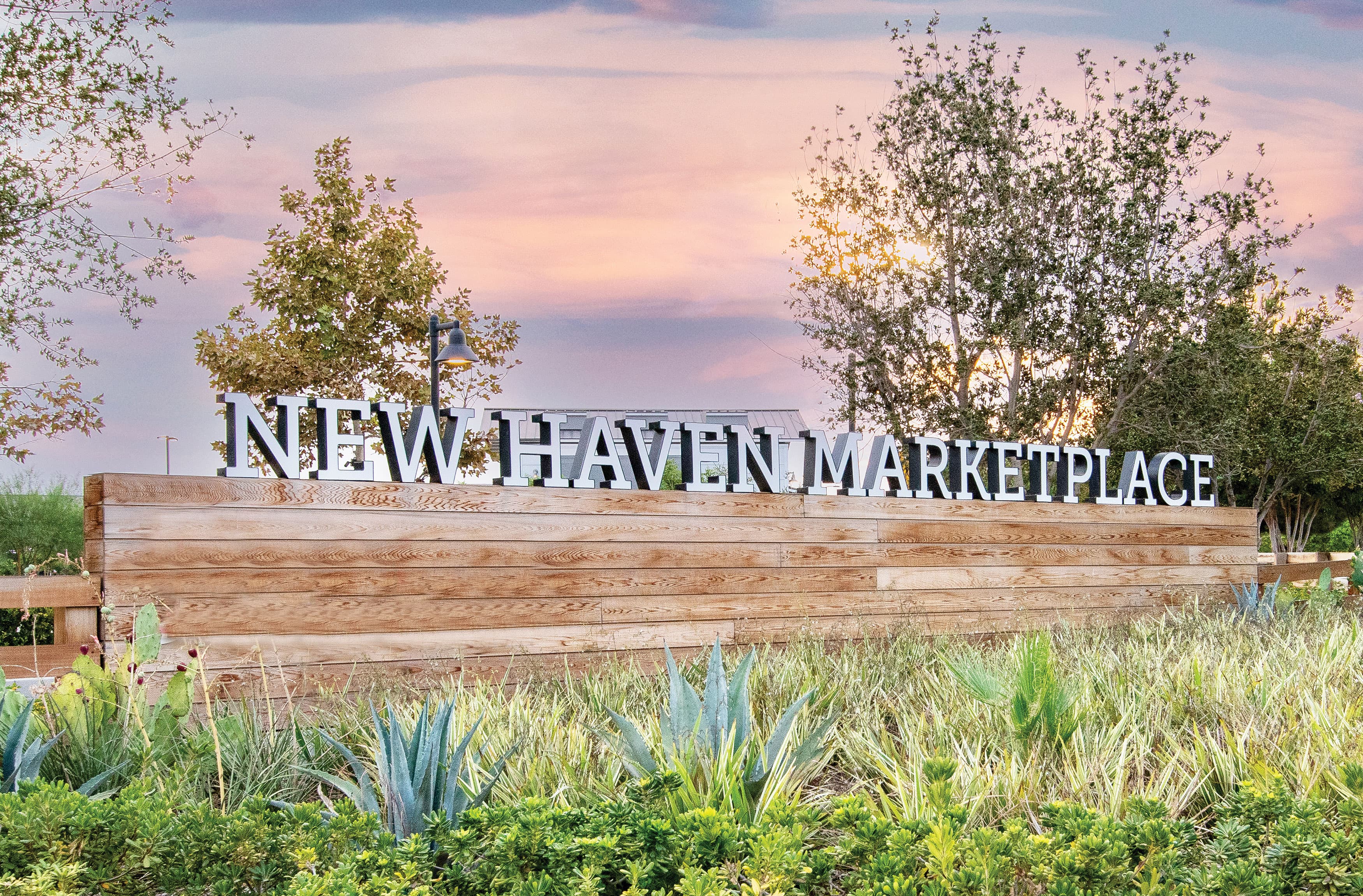 Monument wooden signage for New Haven Marketplace in Ontario, California. 