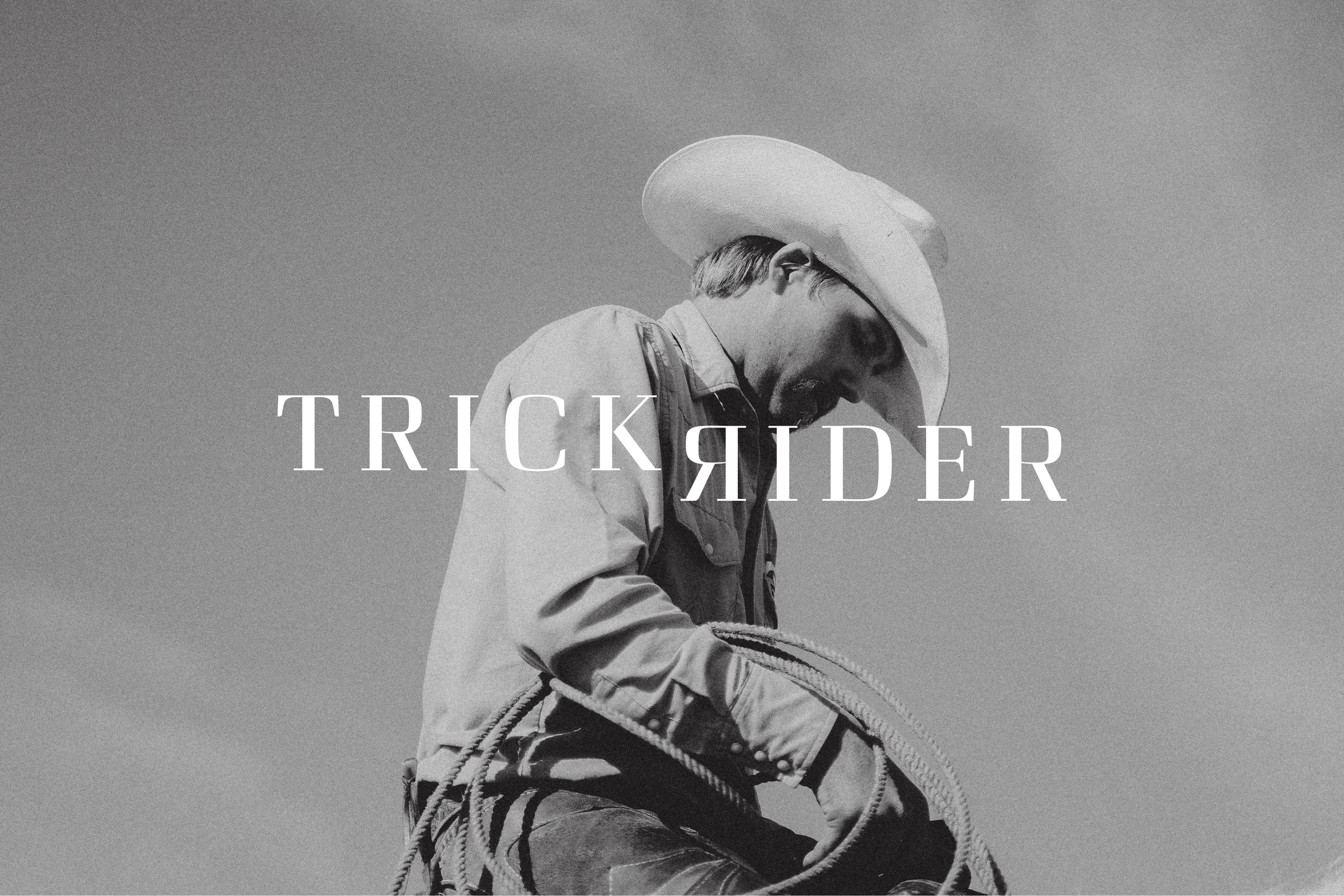 Trick Rider logo overlaid on black and white photo of cowboy in white hat holding coiled lasso rope, Omni PGA Frisco Resort, brand identity by RSM Design.
