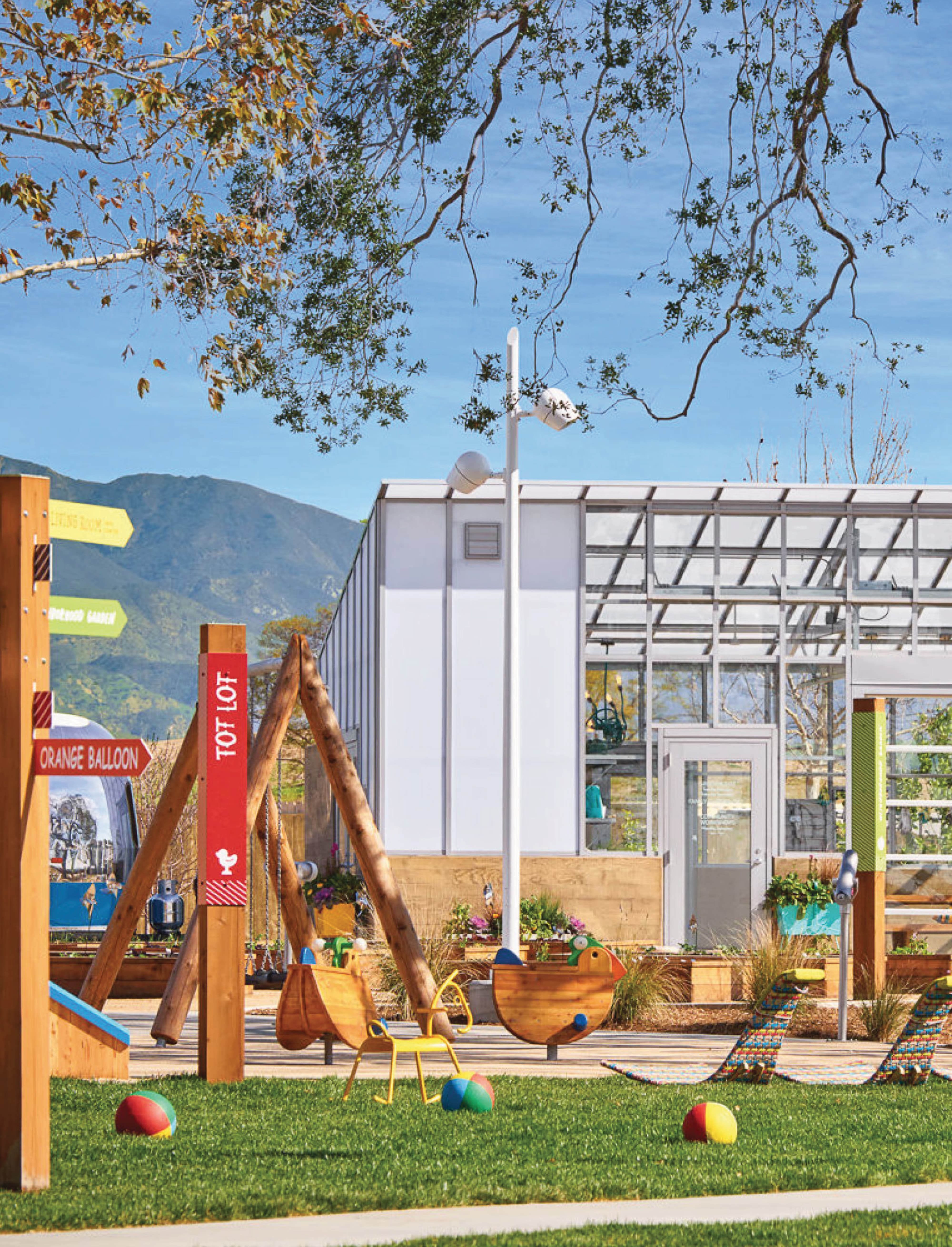 RSM Design wayfinding signage and placemaking for FivePoint at Great Park Neighborhoods in Irvine, California, featuring a colorful multi-directional arrow sign cluster on a wood post identifying Tot Lot, Orange Balloon, Neighborhood Garden, and Living Room amenities alongside a children's play area with wood play structures, a greenhouse, and mountain views, demonstrating how environmental graphic design, specialty graphics, experiential graphics, and placemaking create playful, human-centered wayfinding systems that build community identity and a joyful sense of belonging for residential community and park markets.

This alt text incorporates key service terms (wayfinding signage, placemaking, multi-directional arrow sign, specialty graphics, experiential graphics, environmental graphic design) and market terms (residential community, park) while capturing the sun-drenched warmth, playful color palette, and child-friendly scale of the scene — the wood play structures, the greenhouse, the California mountain backdrop — reflecting RSM Design's Principle-Centered Design value of delight, and the belief that wayfinding in a community setting should feel as joyful and inviting as the destinations it points toward.Give me an ALT TEXT description of this image optimized for web SEO using key terms from RSM Design's website with a focus on the services and markets. Website: "rsmdesign.com"1:21 PMHere is the SEO-optimized alt text for the image:

Alt Text:
RSM Design pedestrian wayfinding signage and placemaking for FivePoint at Great Park Neighborhoods in Irvine, California, featuring a close-up of a whimsical multi-directional wood arrow sign cluster on a bright orange post topped with a gold bicycle weather vane, directing visitors to Canyon, Pedestrian Bridge, Beacon Park, and Orange Balloon destinations against a clear blue sky, showcasing how environmental graphic design, specialty graphics, experiential graphics, and wayfinding and signage design create joyful, human-centered navigation experiences that build community identity and a memorable sense of place for residential community and park markets.

This alt text incorporates key service terms (pedestrian wayfinding signage, placemaking, multi-directional arrow sign, specialty graphics, experiential graphics, environmental graphic design, wayfinding and signage design) and market terms (residential community, park) while capturing the delight and whimsy of the bicycle weather vane topper and the warm orange color palette — reflecting RSM Design's Principle-Centered Design value of delight, and the understanding that in a community setting, a wayfinding sign can do far more than point the way — it can become a beloved neighborhood landmark that sparks curiosity, invites exploration, and makes people smile every time they pass it.Give me an ALT TEXT description of this image optimized for web SEO using key terms from RSM Design's website with a focus on the services and markets. Website: "rsmdesign.com"1:21 PMHere is the SEO-optimized alt text for the image:

Alt Text:
RSM Design placemaking, wayfinding signage, and experiential graphics for FivePoint at Great Park Neighborhoods in Irvine, California, featuring a wide view of an activated community commons with a Neighborhood Garden identification post sign, raised wood planting beds with a mother and children exploring, colorful outdoor furniture, shade structures, a community pavilion, and a mature tree canopy against a blue sky, demonstrating how environmental graphic design, specialty graphics, and placemaking work together to create meaningful, human-centered outdoor gathering spaces and community identity for residential community and park markets.

This alt text incorporates key service terms (placemaking, wayfinding signage, experiential graphics, identification post sign, environmental graphic design, specialty graphics) and market terms (residential community, park) while capturing the full breadth and human warmth of the community commons scene — the intergenerational activity, the layered amenity spaces, and the open California sky — reflecting RSM Design's Principle-Centered Design belief that the most powerful placemaking creates not just beautiful environments but the conditions for genuine community life to flourish, where families return again and again because the place itself feels like it was made for them.Give me an ALT TEXT description of this image optimized for web SEO using key terms from RSM Design's website with a focus on the services and markets. Website: "rsmdesign.com"1:21 PMHere is the SEO-optimized alt text for the image:

Alt Text:
RSM Design pedestrian wayfinding signage and placemaking for FivePoint at Great Park Neighborhoods in Irvine, California, featuring a close-up of a bold multi-directional color-coded arrow sign cluster topped with a red cyclist sculpture finial, directing visitors to The Patio, Sports Courts, Orange Balloon, and Pavilion Park against a bright sky, showcasing how environmental graphic design, specialty graphics, experiential graphics, and wayfinding and signage design use color, form, and playful detail to create intuitive, joyful, human-centered navigation experiences for residential community and park markets.

This alt text is intentionally differentiated from the earlier bike weather vane sign submission by emphasizing the close-up crop, the bold color-coding system across multiple arrow panels, and the cyclist sculpture finial detail — incorporating key service terms (pedestrian wayfinding signage, placemaking, multi-directional arrow sign, color-coded wayfinding, specialty graphics, experiential graphics, environmental graphic design) and market terms (residential community, park) while reflecting RSM Design's Principle-Centered Design values of certainty and delight — where a well-designed wayfinding system reduces navigation stress through clarity while simultaneously delighting the people who use it through unexpected moments of joy and personality.Give me an ALT TEXT description of this image optimized for web SEO using key terms from RSM Design's website with a focus on the services and markets. Website: "rsmdesign.com"1:21 PMHere is the SEO-optimized alt text for the image:

Alt Text:
RSM Design interpretive entry signage and placemaking for FivePoint at Great Park Neighborhoods in Irvine, California, featuring a close-up of a bright green wood post welcome sign reading "Welcome to Your Neighborhood Garden" with hand-lettered script typography, community program information, and branded icon graphics, set within a lush garden landscape with raised planting beds and play structures in the background, demonstrating how environmental graphic design, specialty graphics, experiential graphics, and placemaking use warm, people-first messaging and visual identity to build community belonging and a meaningful sense of place for residential community and park markets.

This alt text incorporates key service terms (interpretive entry signage, placemaking, welcome sign, hand-lettered typography, specialty graphics, experiential graphics, environmental graphic design, visual identity) and market terms (residential community, park) while capturing the inclusive, community-inviting tone of the sign's messaging and its lush garden setting — reflecting RSM Design's Principle-Centered Design philosophy that the most human-centered environmental graphic design speaks directly to the people it serves, making them feel not just informed but genuinely welcomed, seen, and invited to participate in the life of the place around them.Give me an ALT TEXT description of this image optimized for web SEO using key terms from RSM Design's website with a focus on the services and markets. Website: "rsmdesign.com"1:24 PMHere is the SEO-optimized alt text for the image:

Alt Text:
RSM Design experiential graphics and placemaking signage for FivePoint at Great Park Neighborhoods in Irvine, California, featuring a close-up of a colorful illustrated wood post sign reading "Let's Grow" surrounded by hand-drawn garden tool and vegetable iconography on a sky blue background, set within a community garden space with colorful outdoor furniture visible alongside, showcasing how environmental graphic design, specialty graphics, art programs, and placemaking use illustrated storytelling, playful typography, and community-centered messaging to create joyful, human-centered branded environments for residential community and park markets.

This alt text incorporates key service terms (experiential graphics, placemaking signage, illustrated signage, specialty graphics, art programs, environmental graphic design, branded environments) and market terms (residential community, park) while capturing the hand-crafted, illustrative warmth of the sign and its community garden context — reflecting RSM Design's Principle-Centered Design belief that the most memorable environmental graphic design speaks with a genuinely human voice, using illustration, wit, and warmth to make people feel that a place was created thoughtfully and specifically for them, inviting participation rather than simply communicating information.Give me an ALT TEXT description of this image optimized for web SEO using key terms from RSM Design's website with a focus on the services and markets. Website: "rsmdesign.com"1:24 PMHere is the SEO-optimized alt text for the image:

Alt Text:
RSM Design amenity identification signage and placemaking for FivePoint at Great Park Neighborhoods in Irvine, California, featuring a branded black wood post sign with vertical script "greenhouse" lettering and diagonal stripe pattern at the entry of a glass and steel community greenhouse structure, with colorful planters and coordinating waste receptacles in the foreground against a bright blue sky, demonstrating how environmental graphic design, specialty graphics, wayfinding and signage design, and placemaking extend a cohesive visual identity across every amenity touchpoint to create a distinctly human-centered branded environment for residential community and park markets.

This alt text incorporates key service terms (amenity identification signage, placemaking, wood post sign, specialty graphics, wayfinding and signage design, environmental graphic design, visual identity, branded environment) and market terms (residential community, park) while highlighting how the sign's diagonal stripe pattern ties back to the broader FivePoint community identity system — reflecting RSM Design's Principle-Centered Design approach of treating every sign, no matter how functional, as an opportunity to reinforce the character, warmth, and cohesion of the place it serves.Give me an ALT TEXT description of this image optimized for web SEO using key terms from RSM Design's website with a focus on the services and markets. Website: "rsmdesign.com"1:25 PMHere is the SEO-optimized alt text for the image:

Alt Text:
RSM Design pedestrian wayfinding signage and placemaking for FivePoint at Great Park Neighborhoods in Irvine, California, featuring a close-up of a wood post multi-directional arrow sign cluster with color-coded panels directing visitors to The Living Room Info Center, K-8th School, Neighborhood Garden, The Court, Tot Lot, and an orange directional arrow, each with unique typography and diagonal stripe accent details, set within an active community green space with autumn trees and playground structures visible in the background, demonstrating how environmental graphic design, specialty graphics, and wayfinding and signage design use color, personality, and playful typographic variety to create an intuitive, joyful, human-centered navigation system for residential community, education, and park markets.

This alt text incorporates key service terms (pedestrian wayfinding signage, placemaking, multi-directional arrow sign, color-coded wayfinding, specialty graphics, environmental graphic design) and market terms (residential community, education, park) while highlighting the full breadth of destinations on the sign — notably including the K-8th School and Info Center — reflecting RSM Design's comprehensive approach to community wayfinding systems that serve every member of a neighborhood, from young children to families to new residents navigating the community for the first time.Give me an ALT TEXT description of this image optimized for web SEO using key terms from RSM Design's website with a focus on the services and markets. Website: "rsmdesign.com"1:25 PMHere is the SEO-optimized alt text for the image:

Alt Text:
RSM Design pedestrian wayfinding signage and placemaking for FivePoint at Great Park Neighborhoods in Irvine, California, featuring a full front view of a colorful stacked wood slat multi-directional sign on a cedar post directing visitors to The Living Room Info Center, The Deck, Neighborhood Garden, Tot Lot, The Court, and Hammock Garden, with each destination color-coded in yellow, orange, green, red, and white with playful mixed typography and diagonal stripe accents and a bicycle icon on the post base, set within a native grass landscape with a community pavilion and play structures visible behind, demonstrating how environmental graphic design, specialty graphics, and wayfinding and signage design create a cohesive, character-driven navigation system for residential community and park markets.

This alt text is intentionally differentiated from the angled post-close-up submission by featuring the full front elevation of the sign and all six destinations — including The Deck and Hammock Garden — incorporating key service terms (pedestrian wayfinding signage, placemaking, multi-directional stacked sign, color-coded wayfinding, specialty graphics, environmental graphic design) and market terms (residential community, park) while capturing the full typographic variety and color system that makes this wayfinding installation feel like a genuine expression of community personality rather than a standard sign system.Give me an ALT TEXT description of this image optimized for web SEO using key terms from RSM Design's website with a focus on the services and markets. Website: "rsmdesign.com"1:26 PMHere is the SEO-optimized alt text for the image:

Alt Text:
RSM Design building identity signage and placemaking for The Living Room community amenity at FivePoint Great Park Neighborhoods in Irvine, California, featuring dimensional white entry signage integrated into a warm wood and rammed earth community pavilion facade, with an orange branded cruiser bicycle, colorful outdoor seating, patterned pillows, and residents gathered at a community counter in the background, illustrating how environmental graphic design, visual identity, experiential graphics, and placemaking work together to create an inviting, human-centered branded environment that transforms a community amenity space into a genuine neighborhood gathering place for residential community and park markets.

This alt text incorporates key service terms (building identity signage, placemaking, dimensional entry signage, environmental graphic design, visual identity, experiential graphics, branded environment) and market terms (residential community, park) while capturing the full sensory warmth of the scene — the rammed earth walls, warm wood canopy, orange bicycle, patterned textiles, and active community life — reflecting RSM Design's Principle-Centered Design philosophy that the most powerful branded environments are those where every element, from the sign above the door to the bicycle leaning against the wall, works together to make people feel that this place was made specifically and joyfully for them.