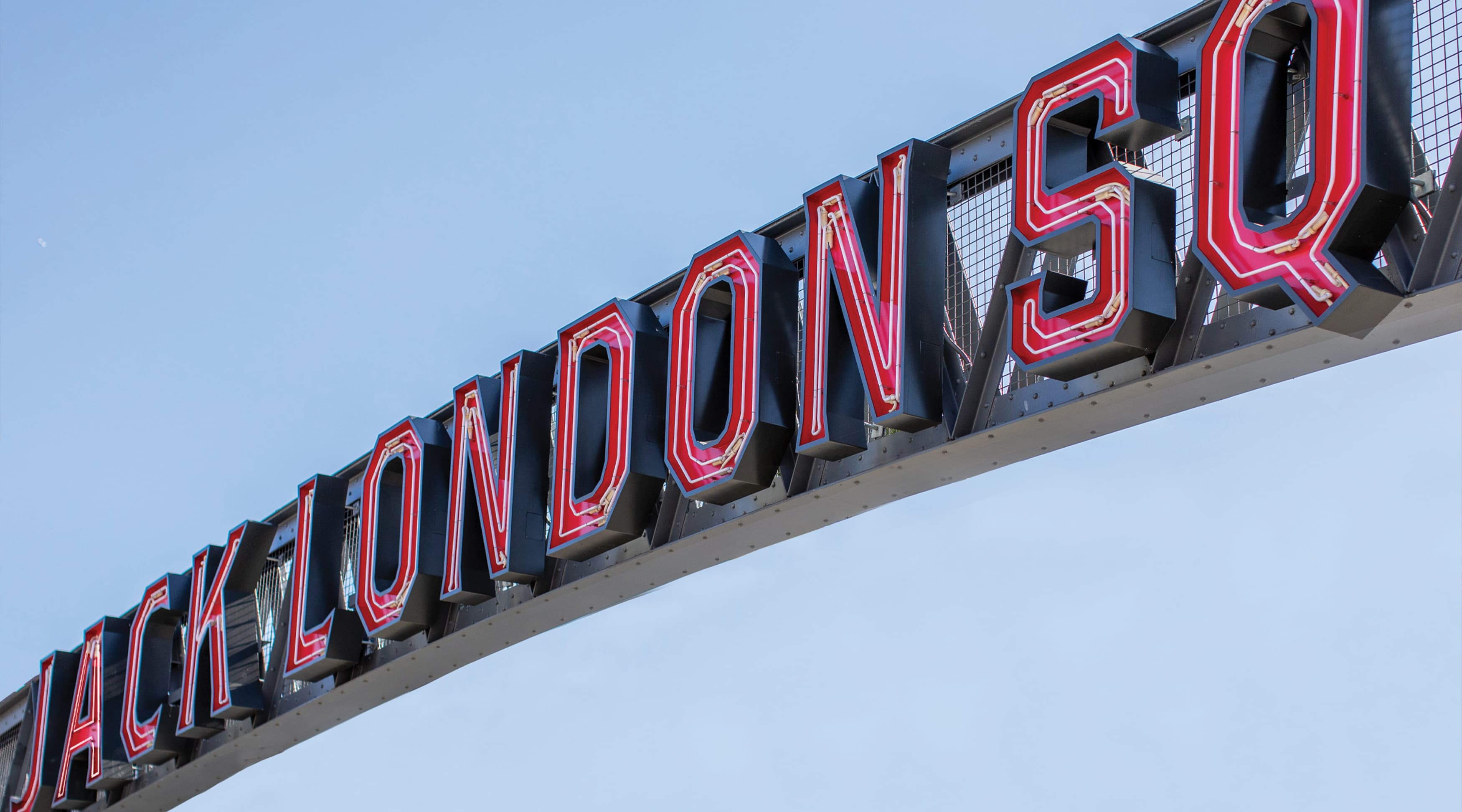 Jack London Square open face channel letters and exposed neon mounted on gateway element