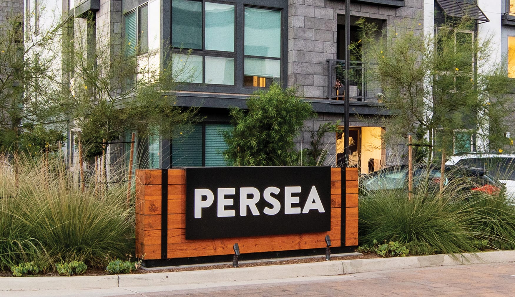 Persea residential community wood monument sign with landscaped entrance, environmental graphic design by RSM Design