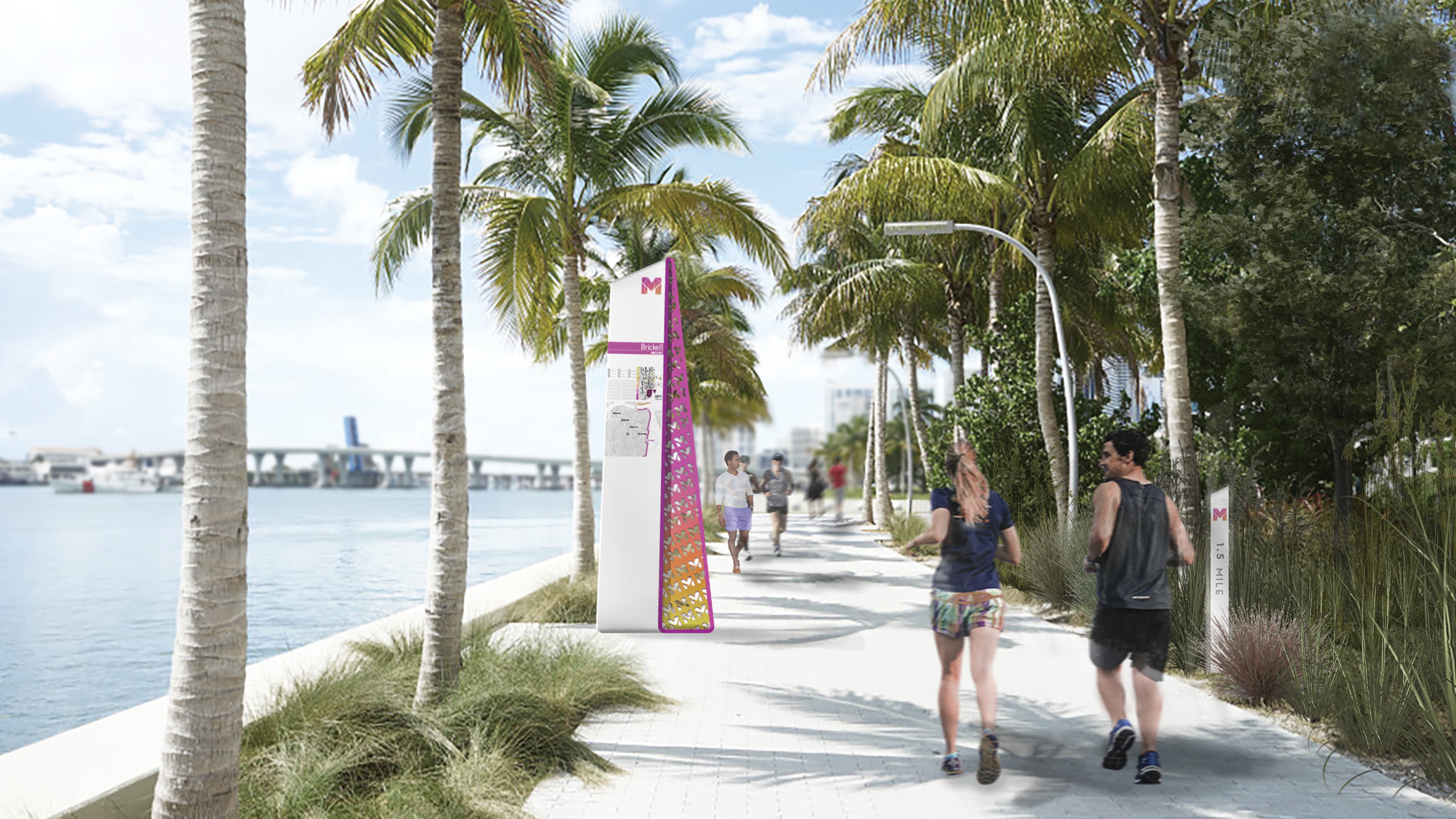 Wayfinding signage along the waterfront walkway of Miami Baywalk.