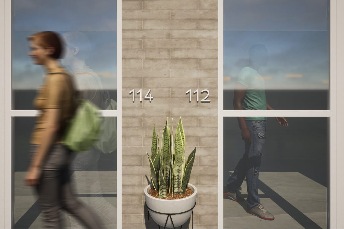 Rendering of a Bloc House corridor detail, showing unit numbers 114 and 112 in white metal numerals mounted on a light brick wall, with a potted snake plant on a wire stand centered beneath them. Residents passing through the glazed corridor are reflected in the windows on either side.