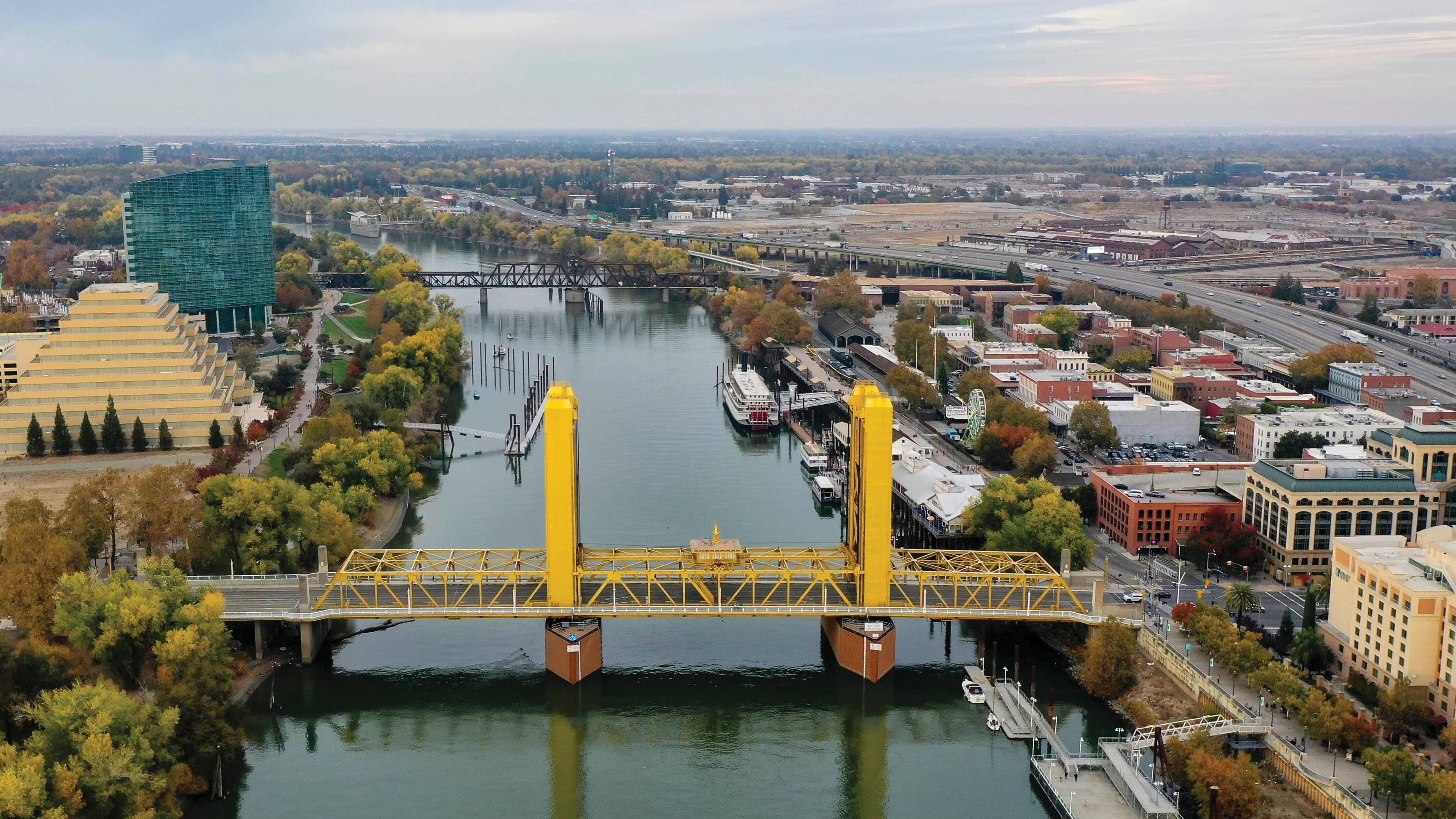 Aerial view of the famed Sacramento waterfront and its golden bridge