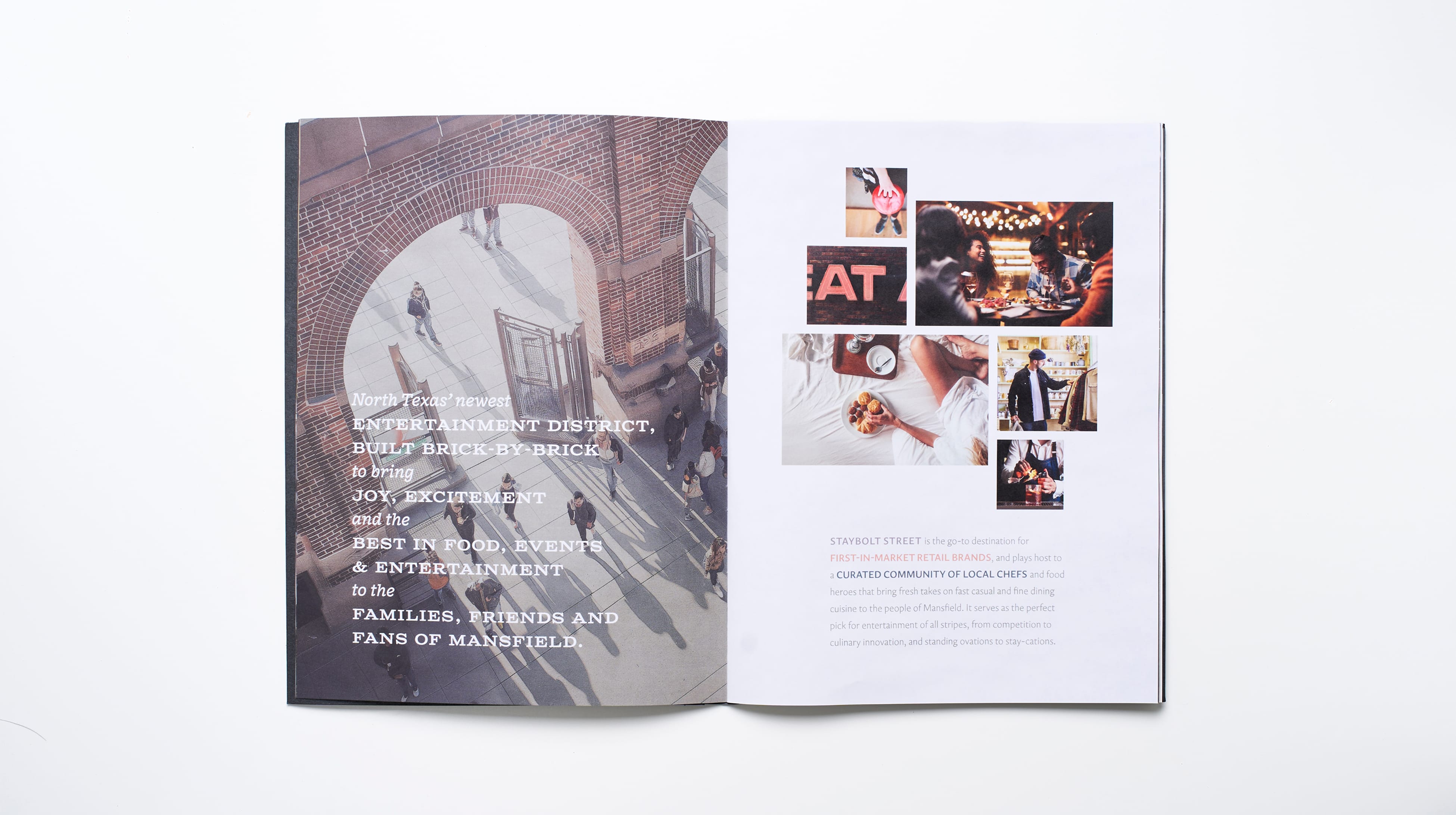 Open leasing brochure spread with an aerial photo of pedestrians beneath a brick archway overlaid with entertainment district copy, paired with a photo grid of dining, shopping, and leisure lifestyle imagery, Staybolt Street, Mansfield, Texas, brand identity and leasing collateral design by RSM Design