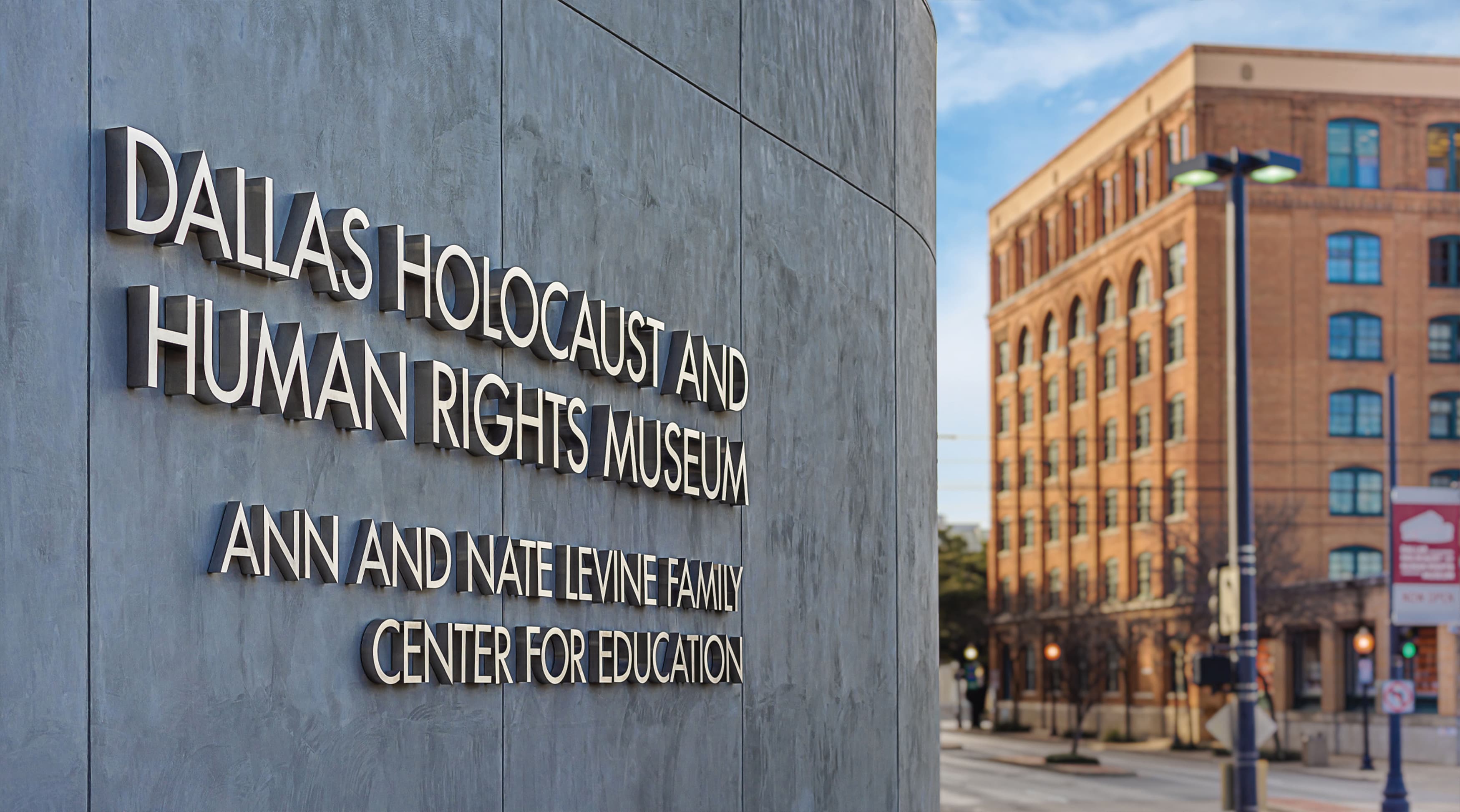 Dallas Holocaust and Human Rights Museum sign identity