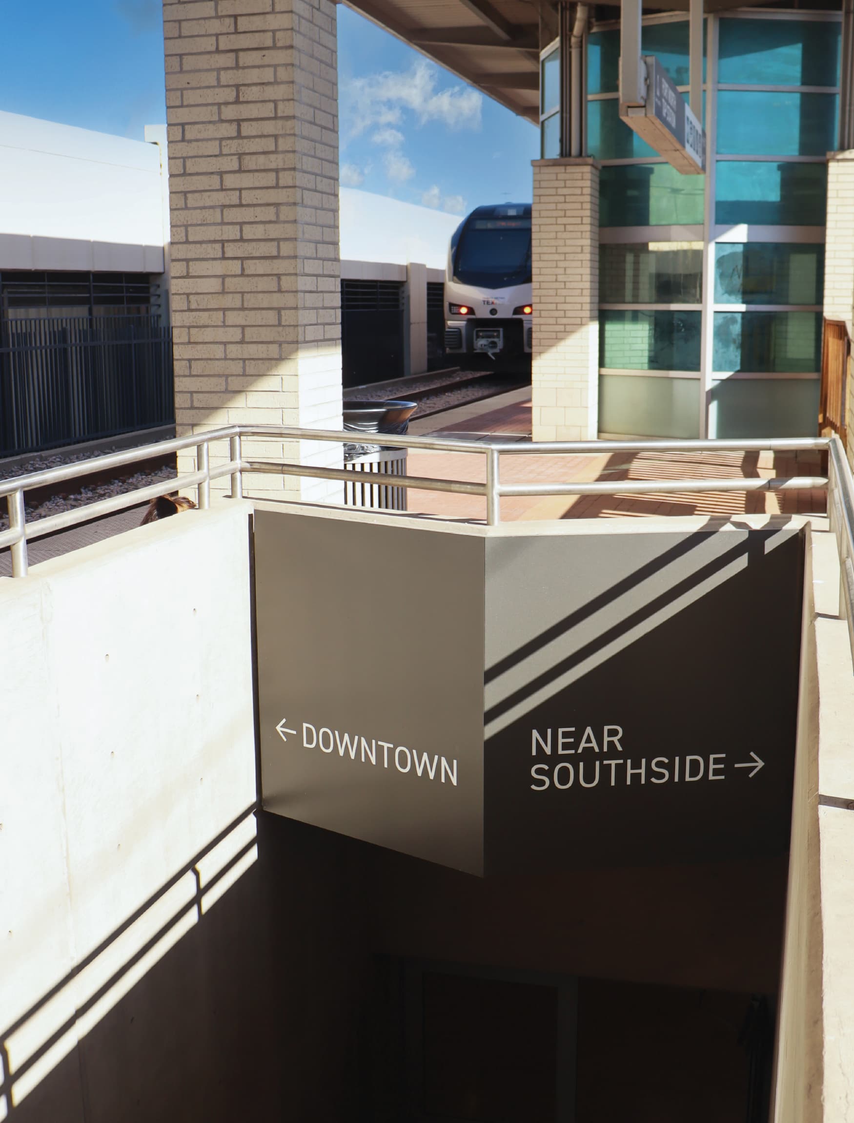 Image of the signage for the underpass at the T&P Station for downtown and near southside in Fort Worth, Texas. 