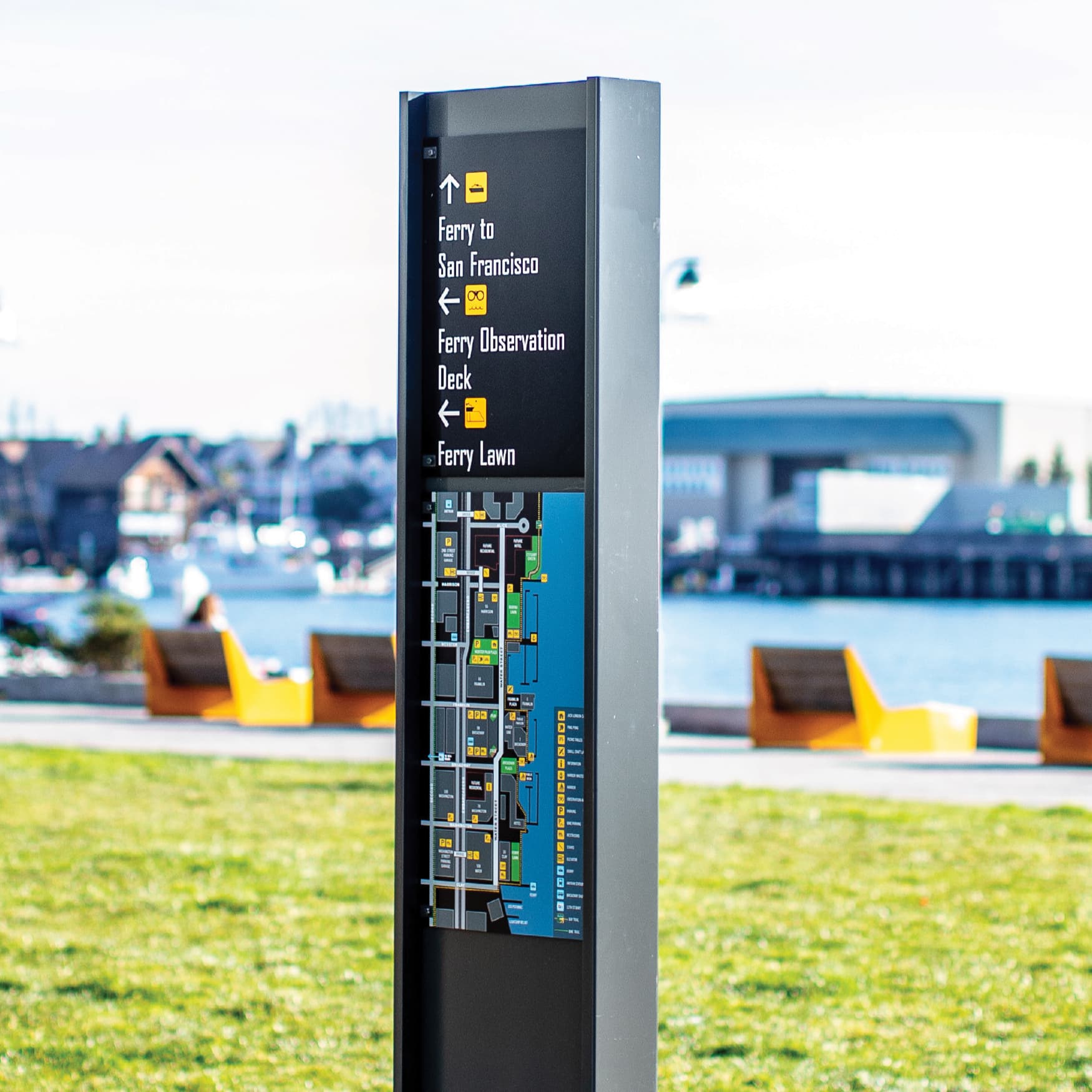 Close up detail image of the wayfinding signage at Jack London Square. 