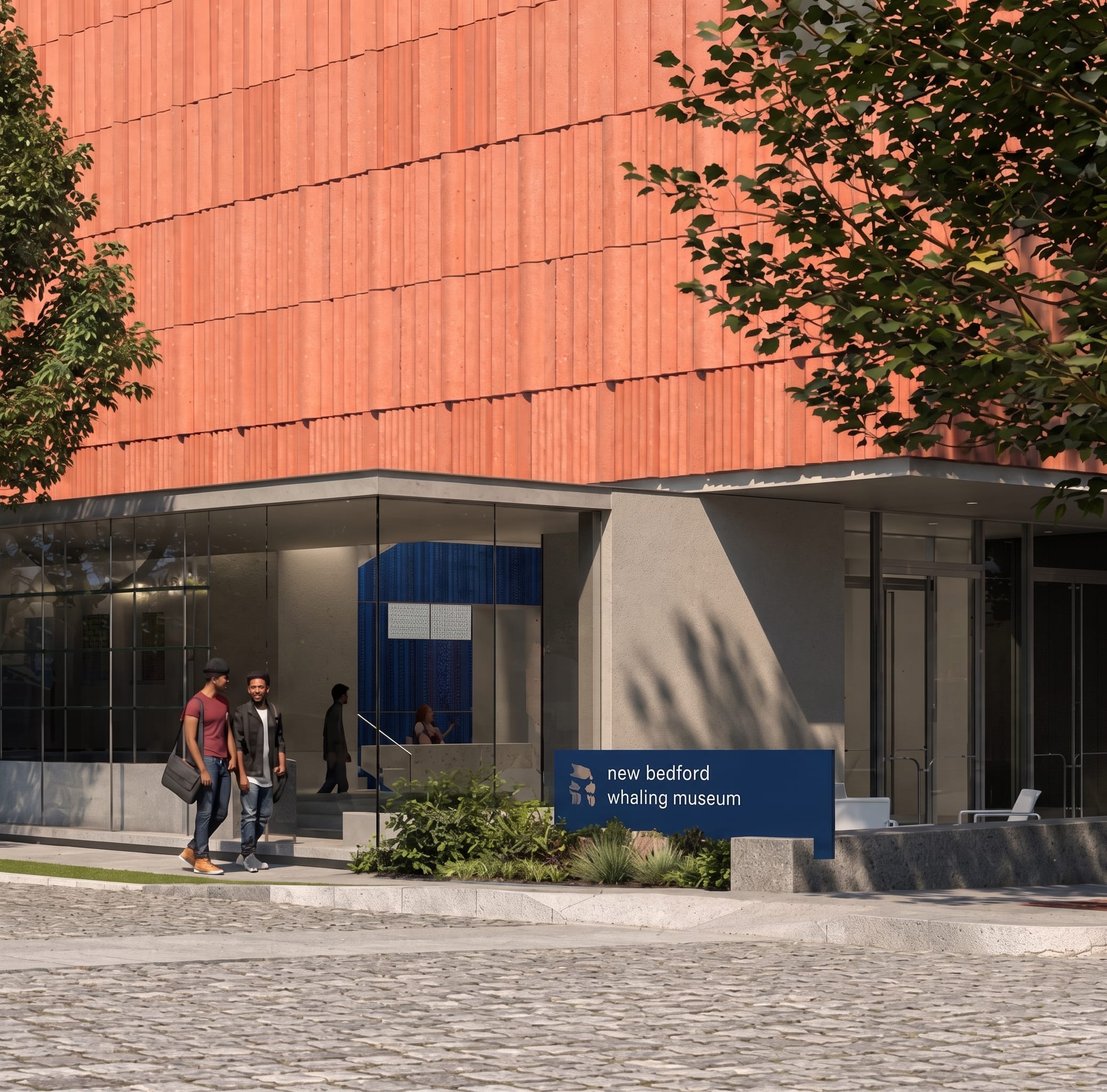 Blue monument sign with logo icon and lowercase lettering reading "new bedford whaling museum," ground-level entrance identification signage by RSM Design
