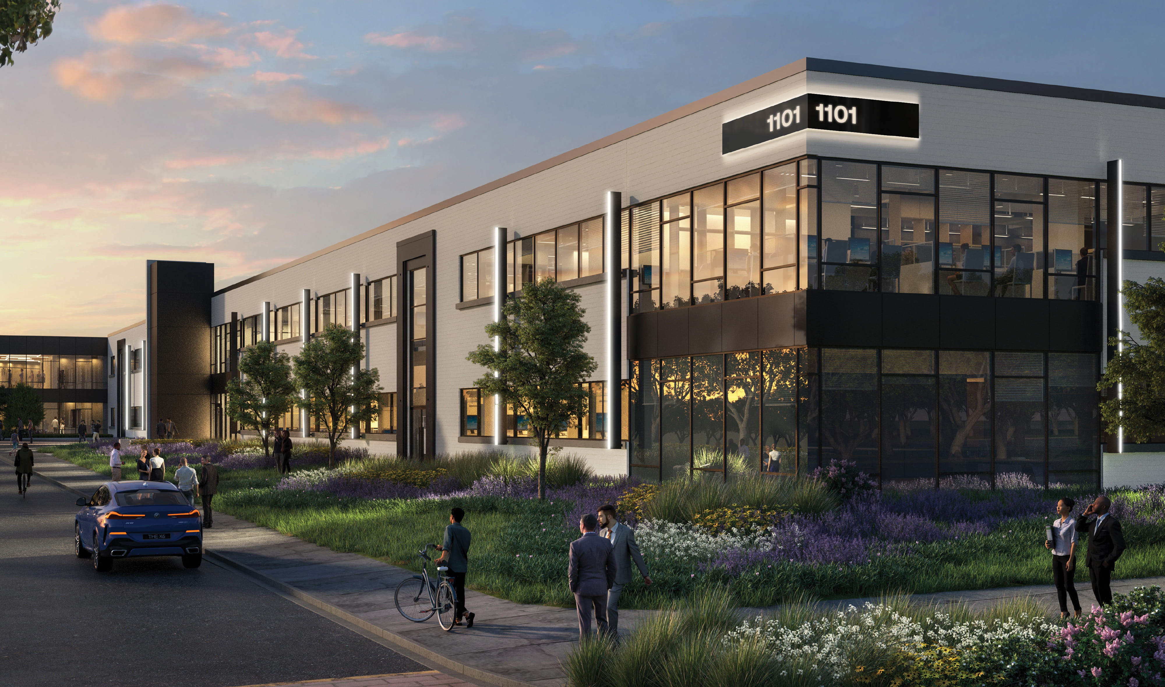 RSM Design photorealistic rendering of exterior building address signage and wayfinding for Continuum Alpharetta, depicting illuminated rooftop address panels displaying 1101 on a modern two-story glass and white panel office building at dusk, with a landscaped campus drive, wildflower plantings, and professionals and cyclists animating the pedestrian environment, demonstrating how environmental graphic design, wayfinding and signage design, master sign program, and branded environments are envisioned during the design process to create clear, legible, and human-centered campus identity for mixed-use workplace, health and wellness, and science and technology markets.