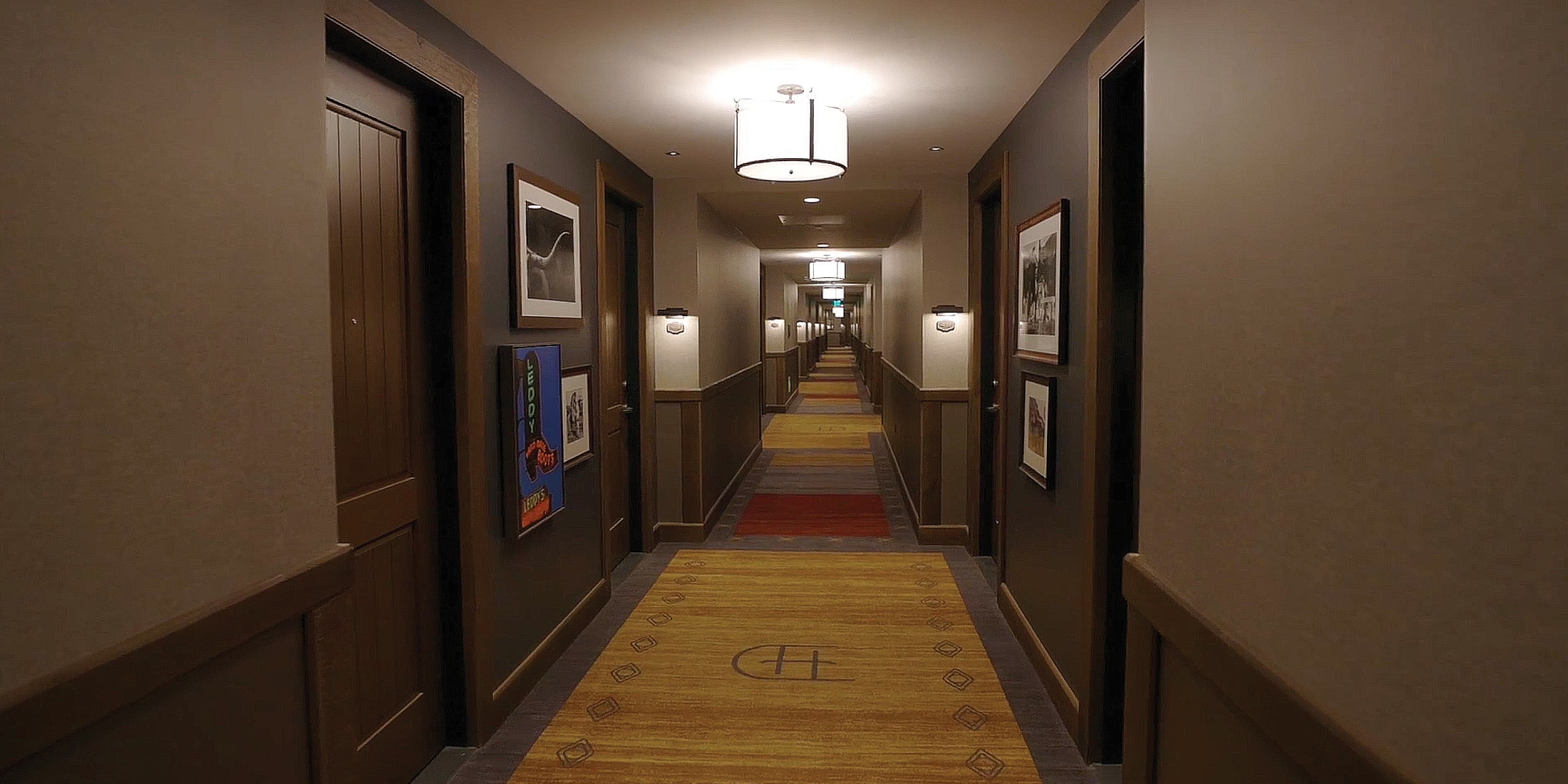 Interior hotel hallway room plaques. 