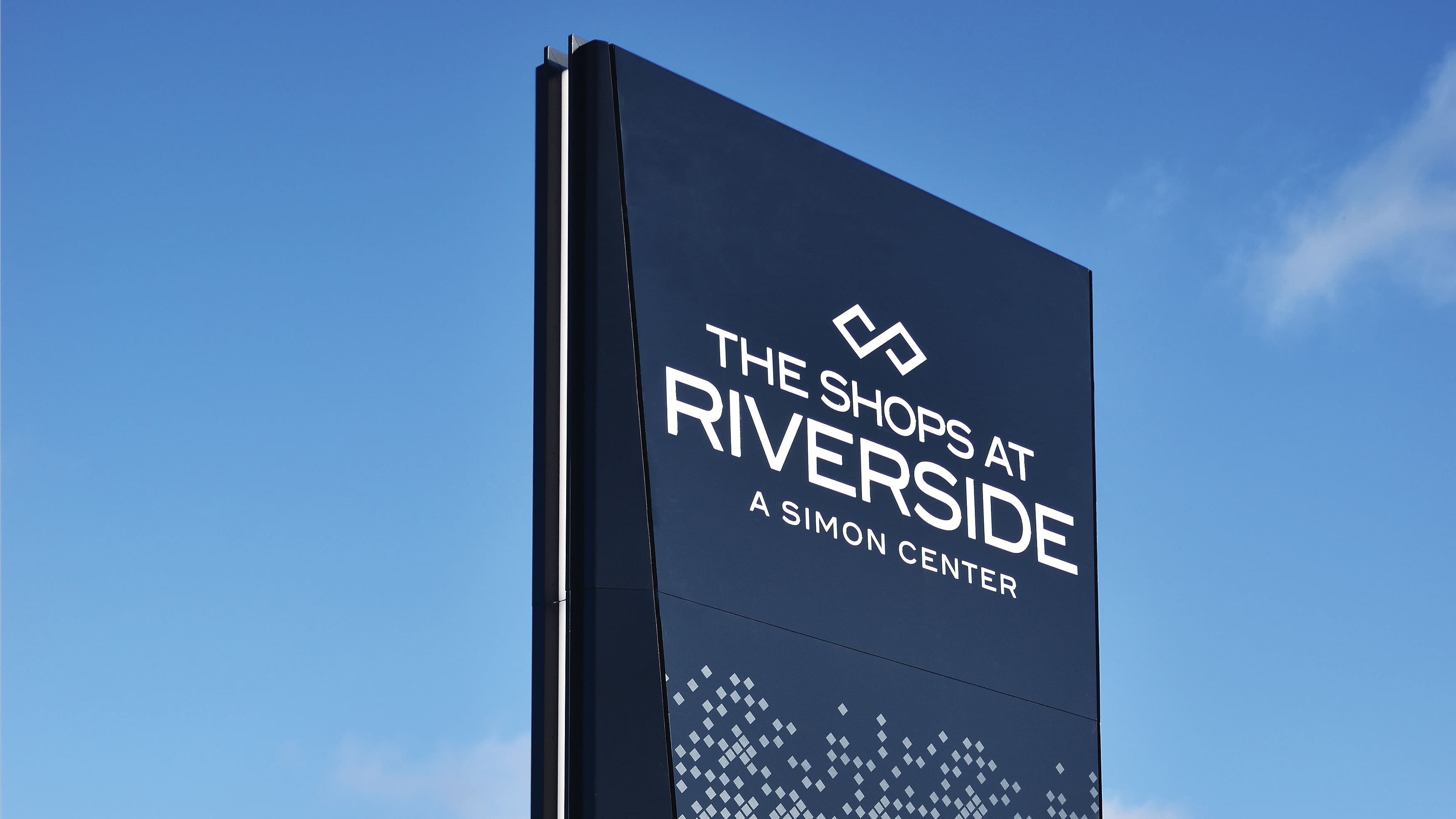 Exterior sign at the Shops at Riverside mall in New Jersey.