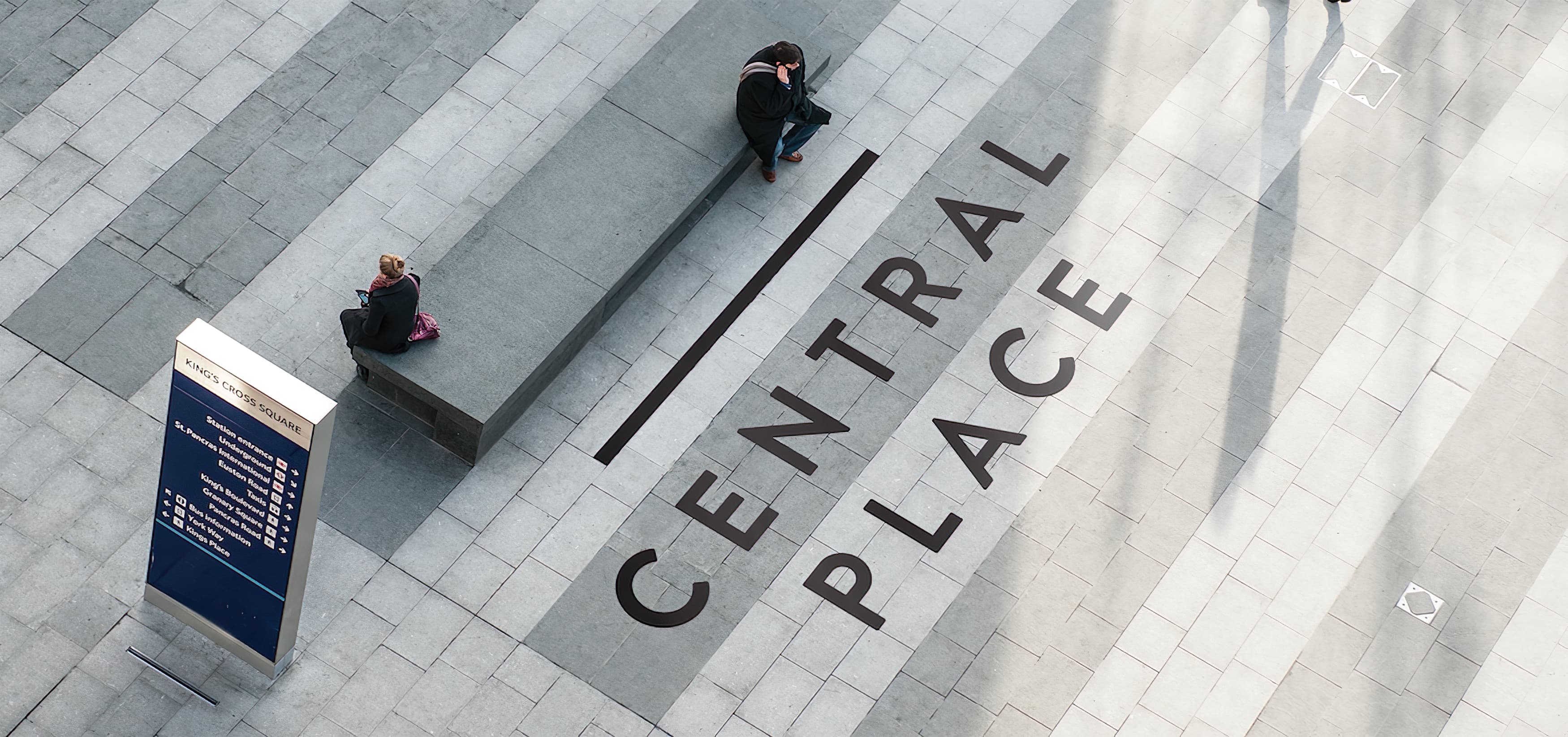 Central Place, a mixed-use project in Rosslyn, Virginia. RSM Design prepared a wayfinding and signage system. Paving Graphic.