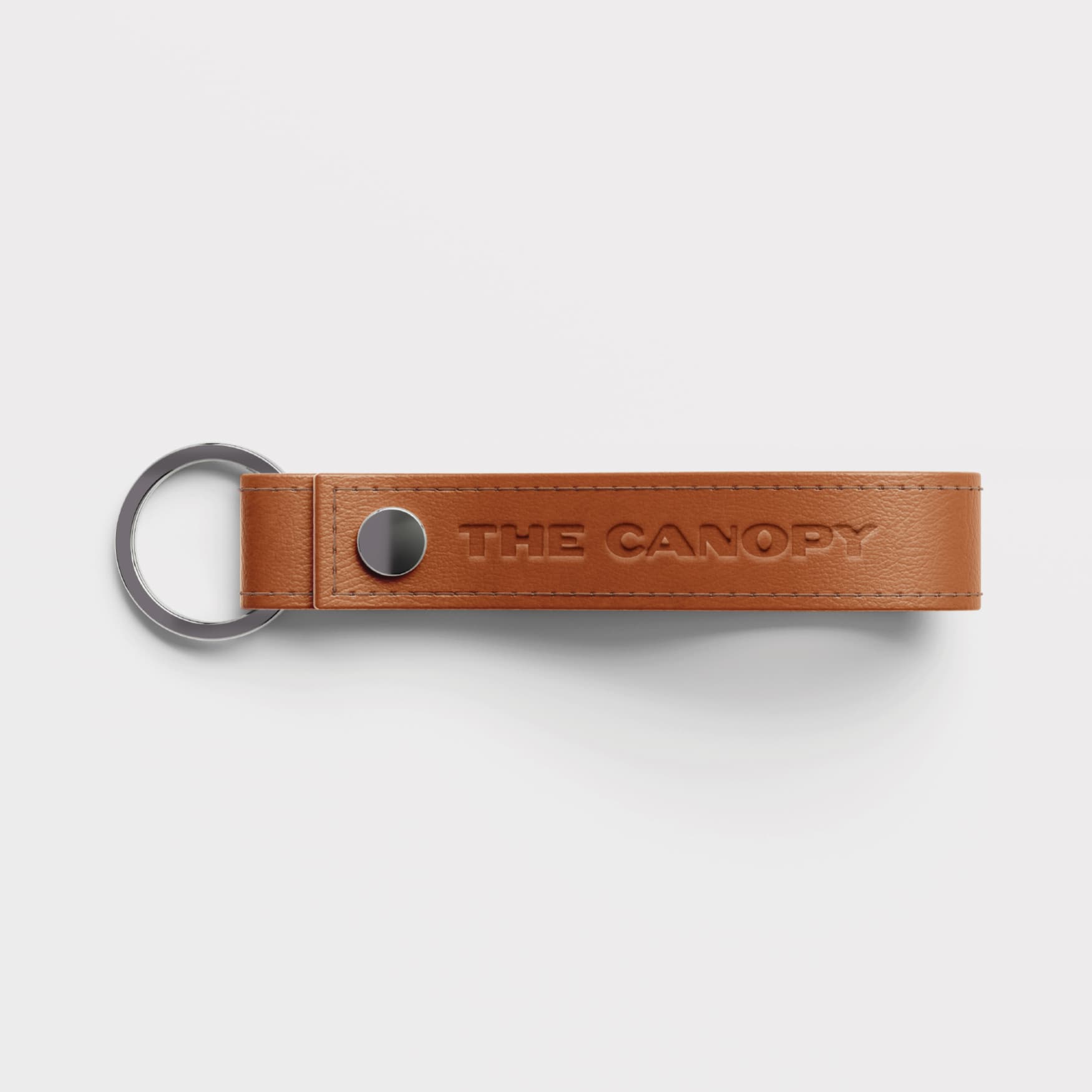 Image of a leather keychain from the Canopy at Great Park. 