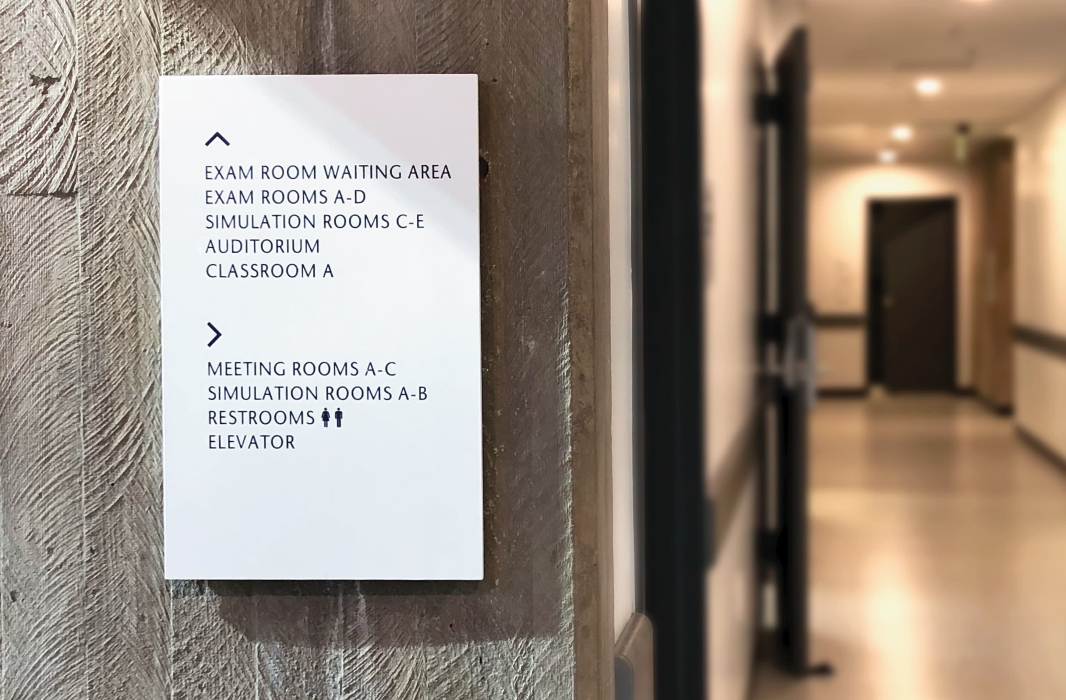 Image of the directional signage at UCLA Rosenfeld Hall in Los Angeles. 