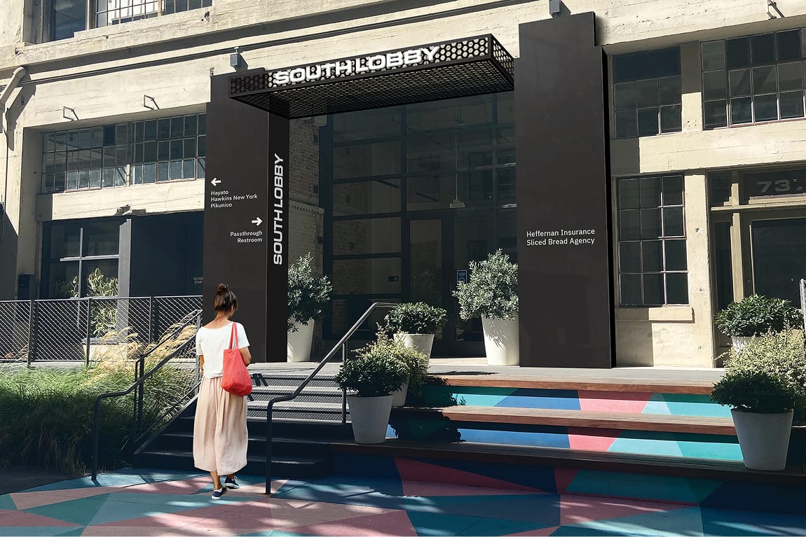 South Lobby entrance sign with tenant directories and painted geometric steps at ROW DTLA - wayfinding and environmental graphic design by RSM Design